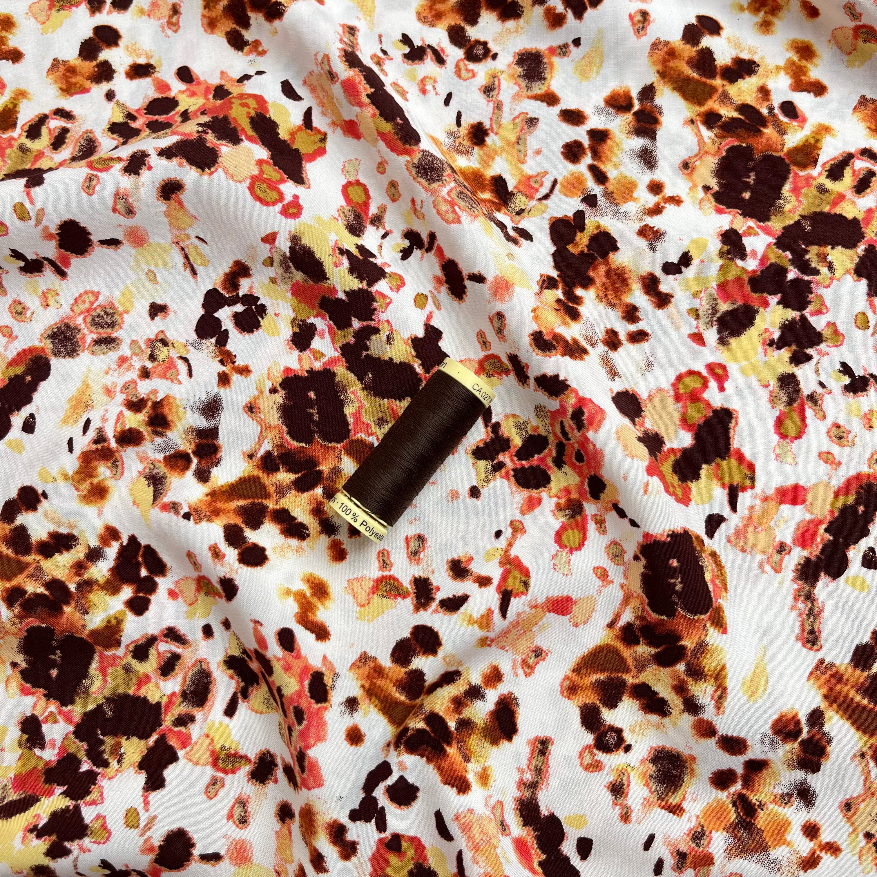Watercolour Splash in Rust Viscose Poplin Fabric