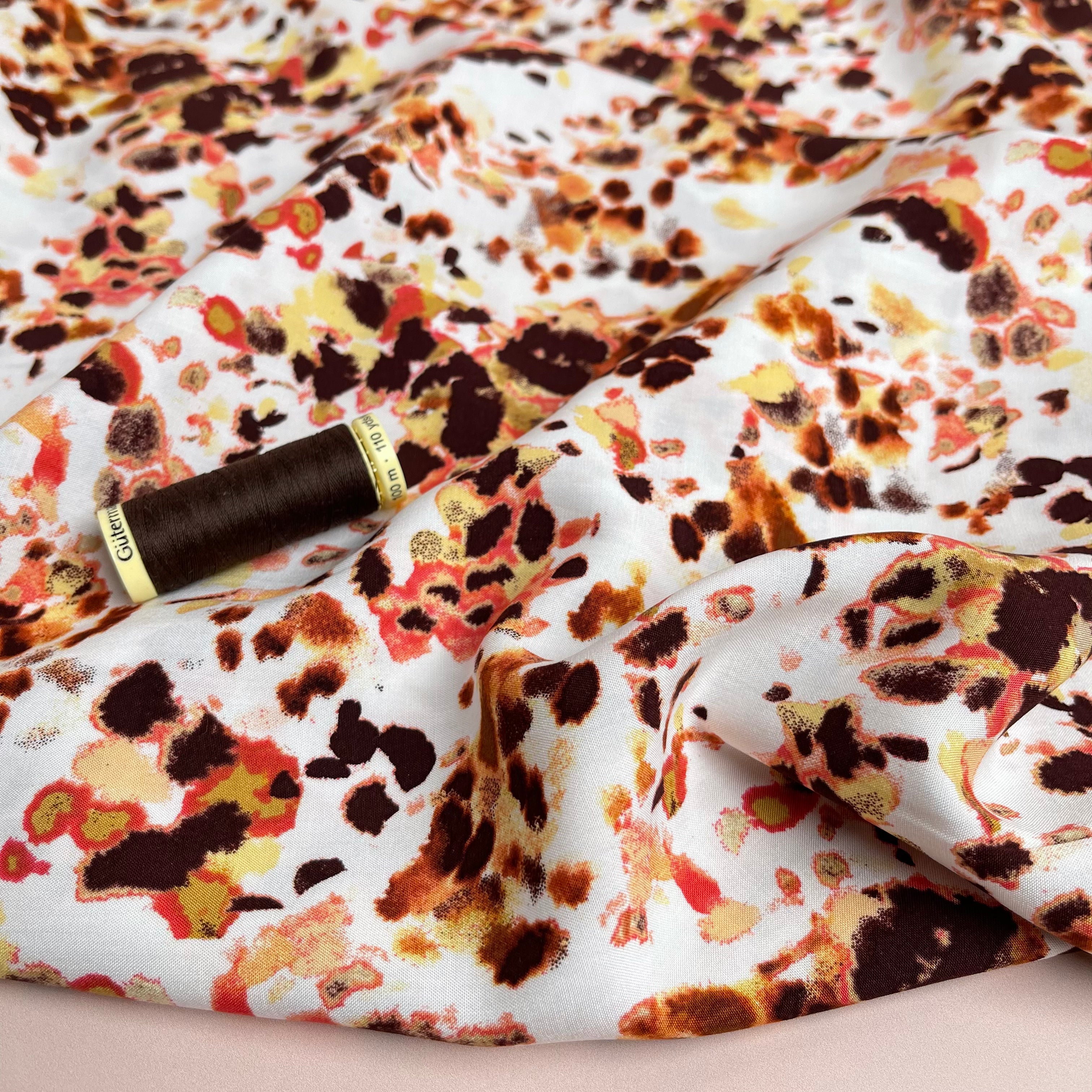 Watercolour Splash in Rust Viscose Poplin Fabric