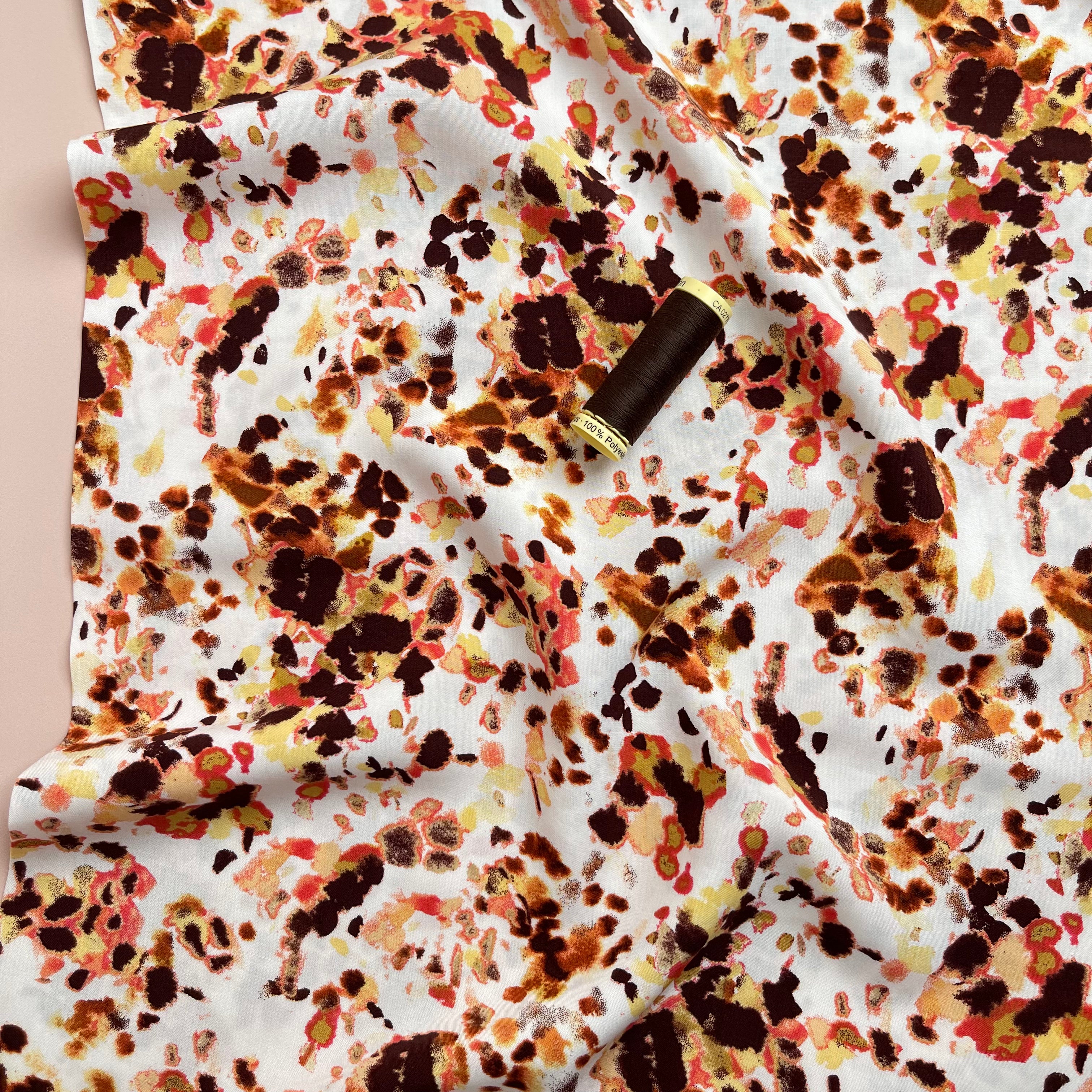 Watercolour Splash in Rust Viscose Poplin Fabric
