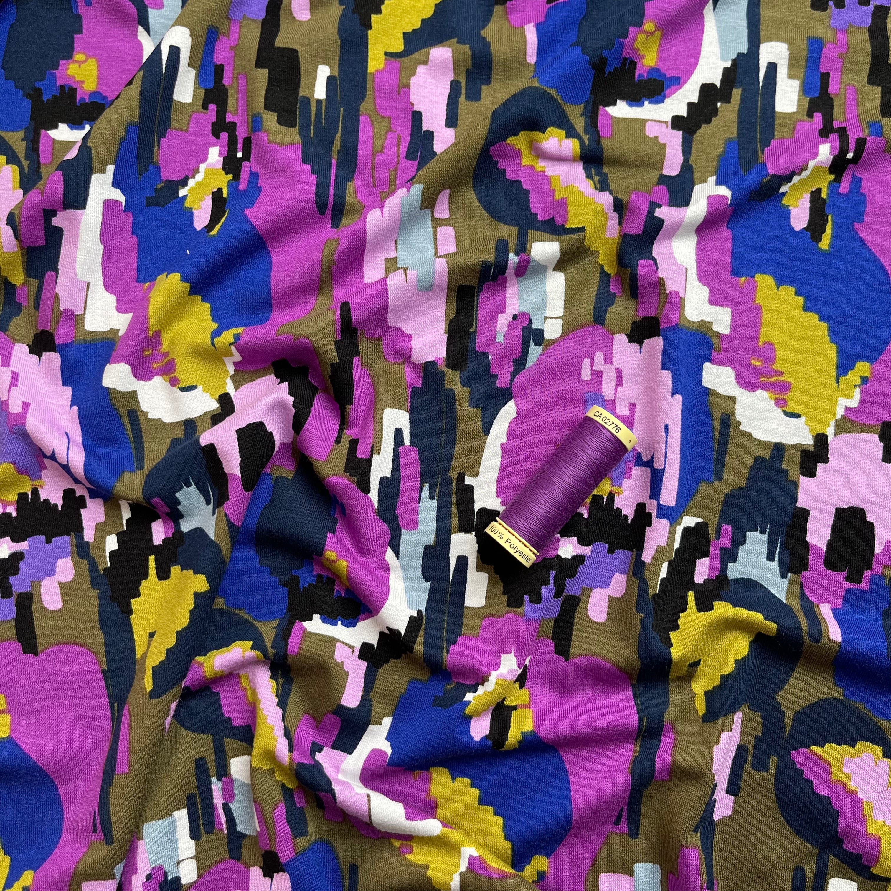 REMNANT 0.68 Metres (plus free section with faults) - Pixel Flowers in Purple Viscose Jersey Fabric