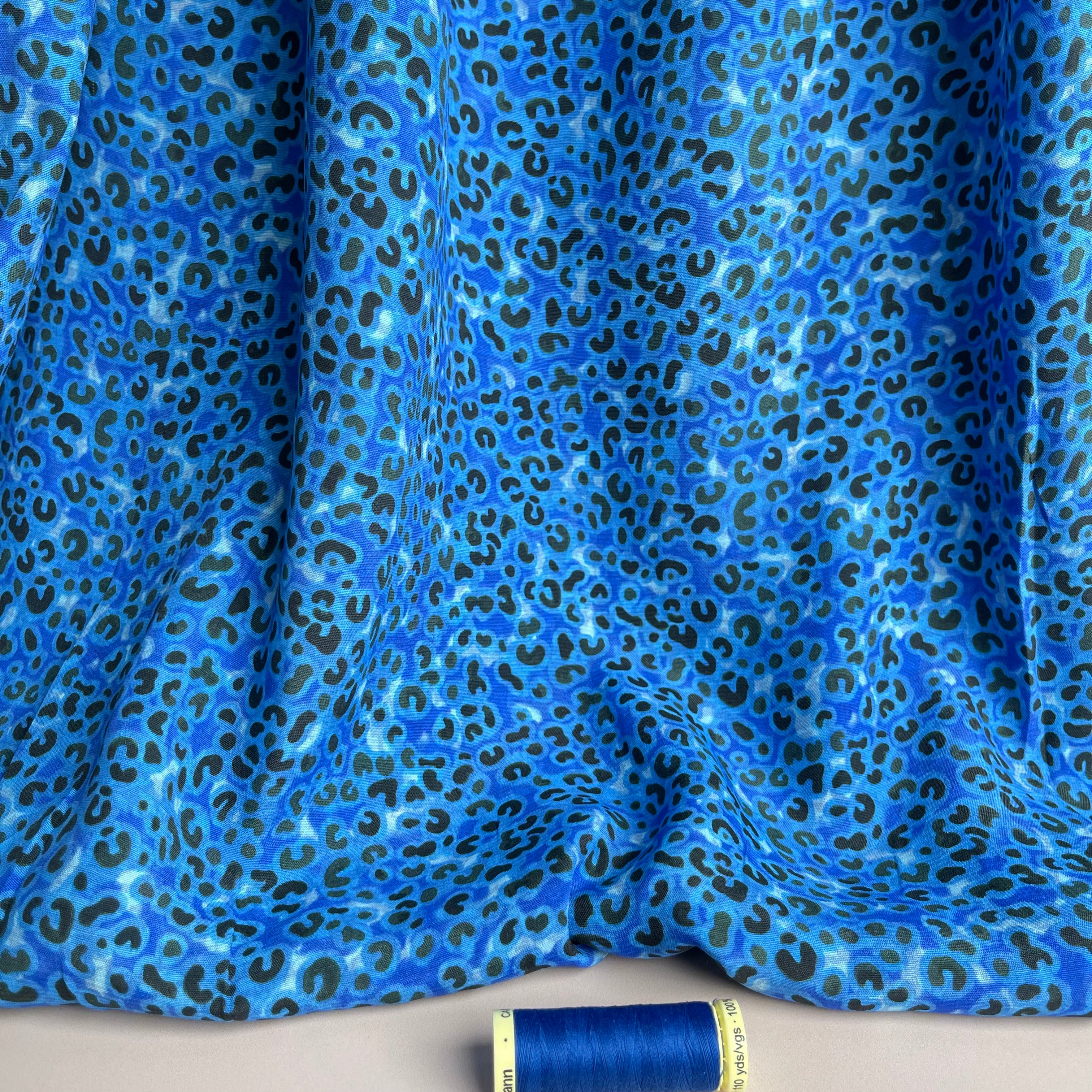 Leopard Print in Cobalt Viscose Crepe with LENZING™ ECOVERO™ fibres.
