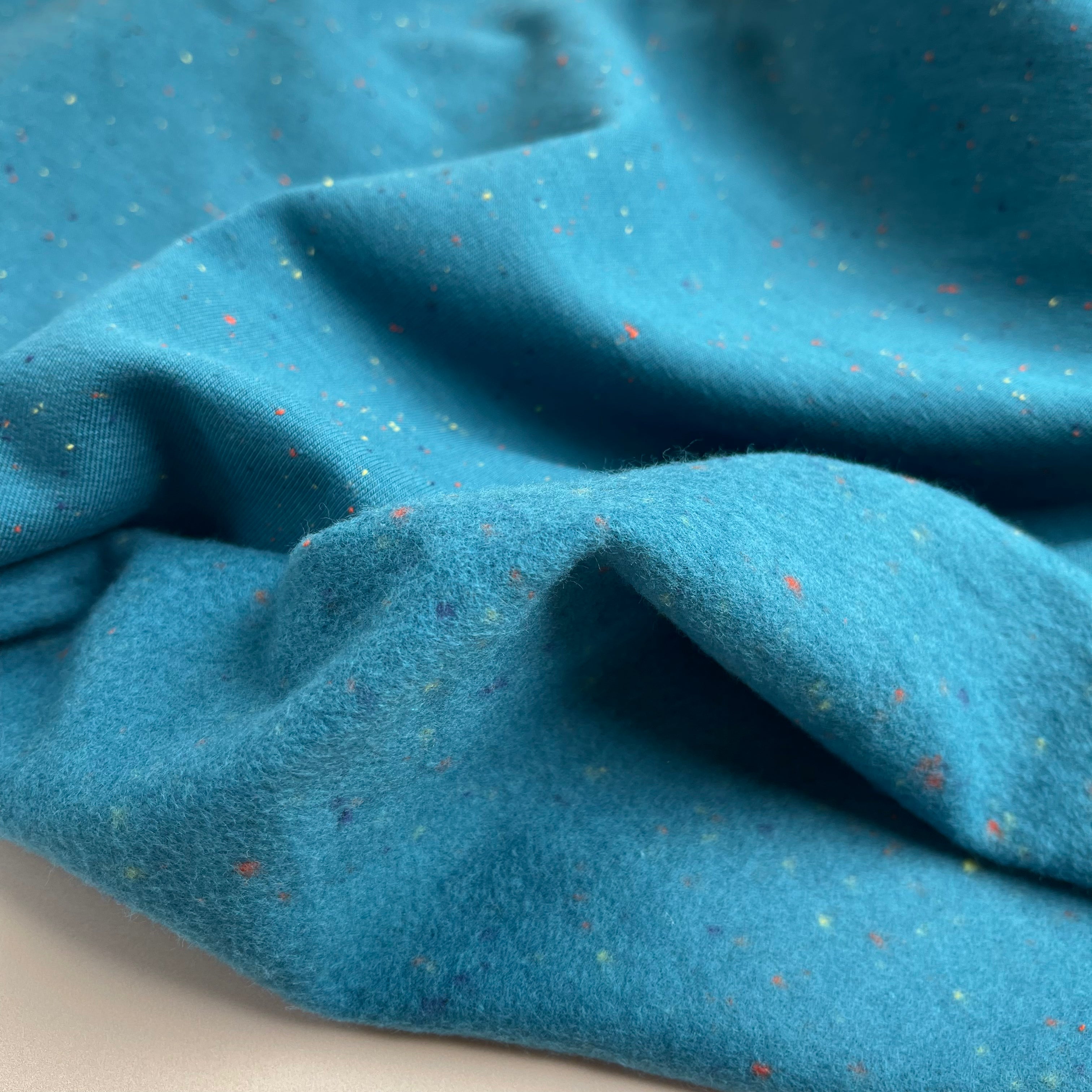Cosy Colours in Petrol with multi Flecks Sweat-Shirting
