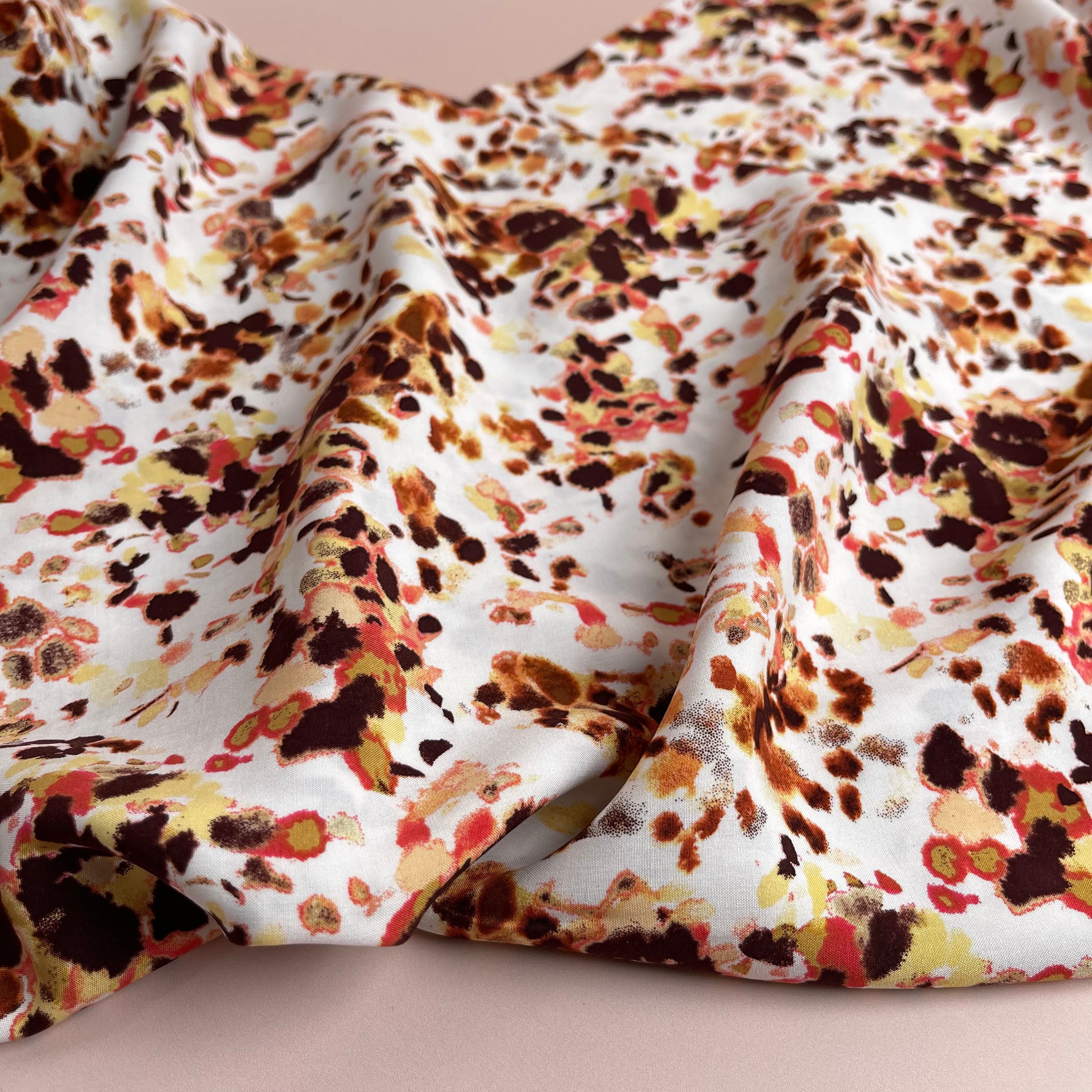 Watercolour Splash in Rust Viscose Poplin Fabric