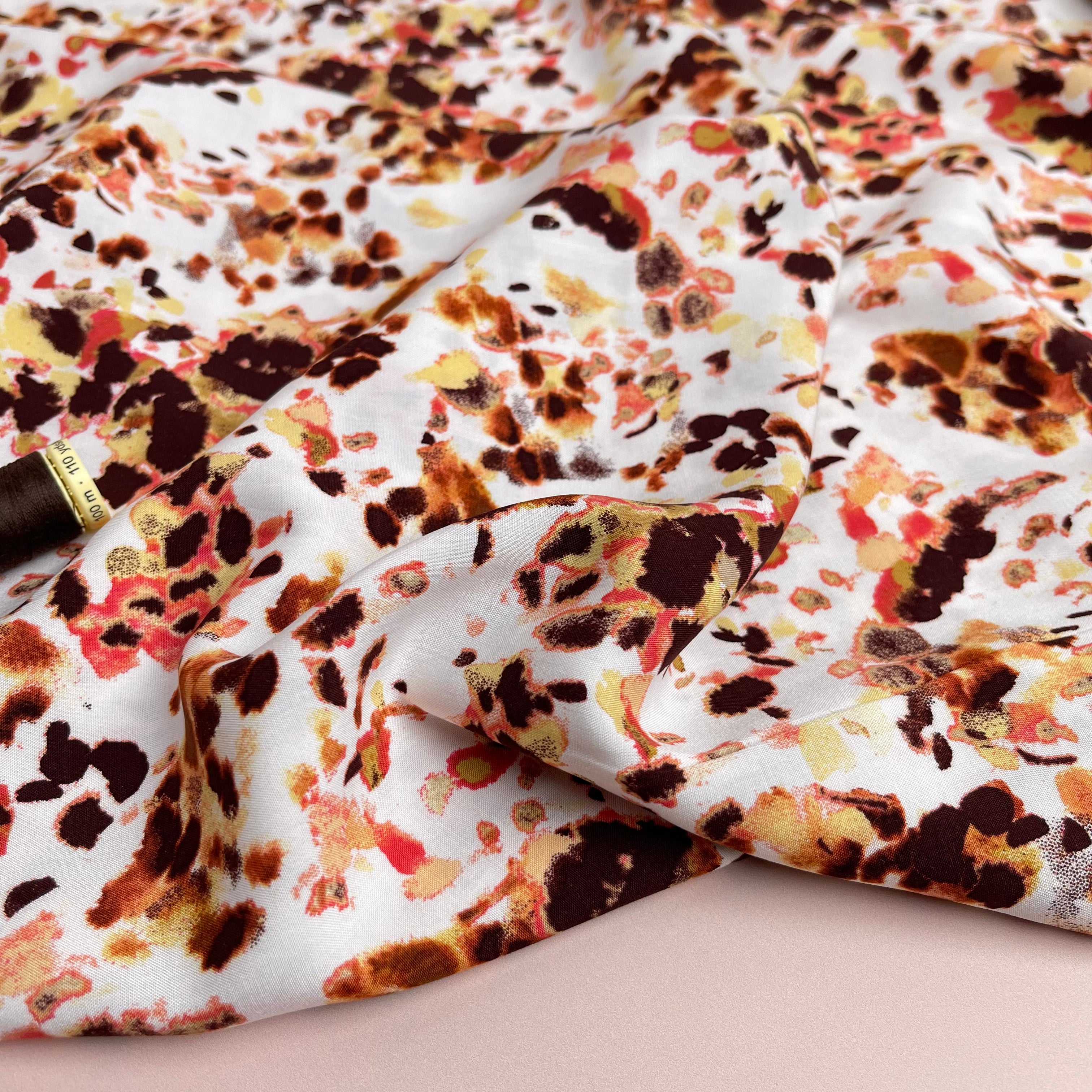Watercolour Splash in Rust Viscose Poplin Fabric
