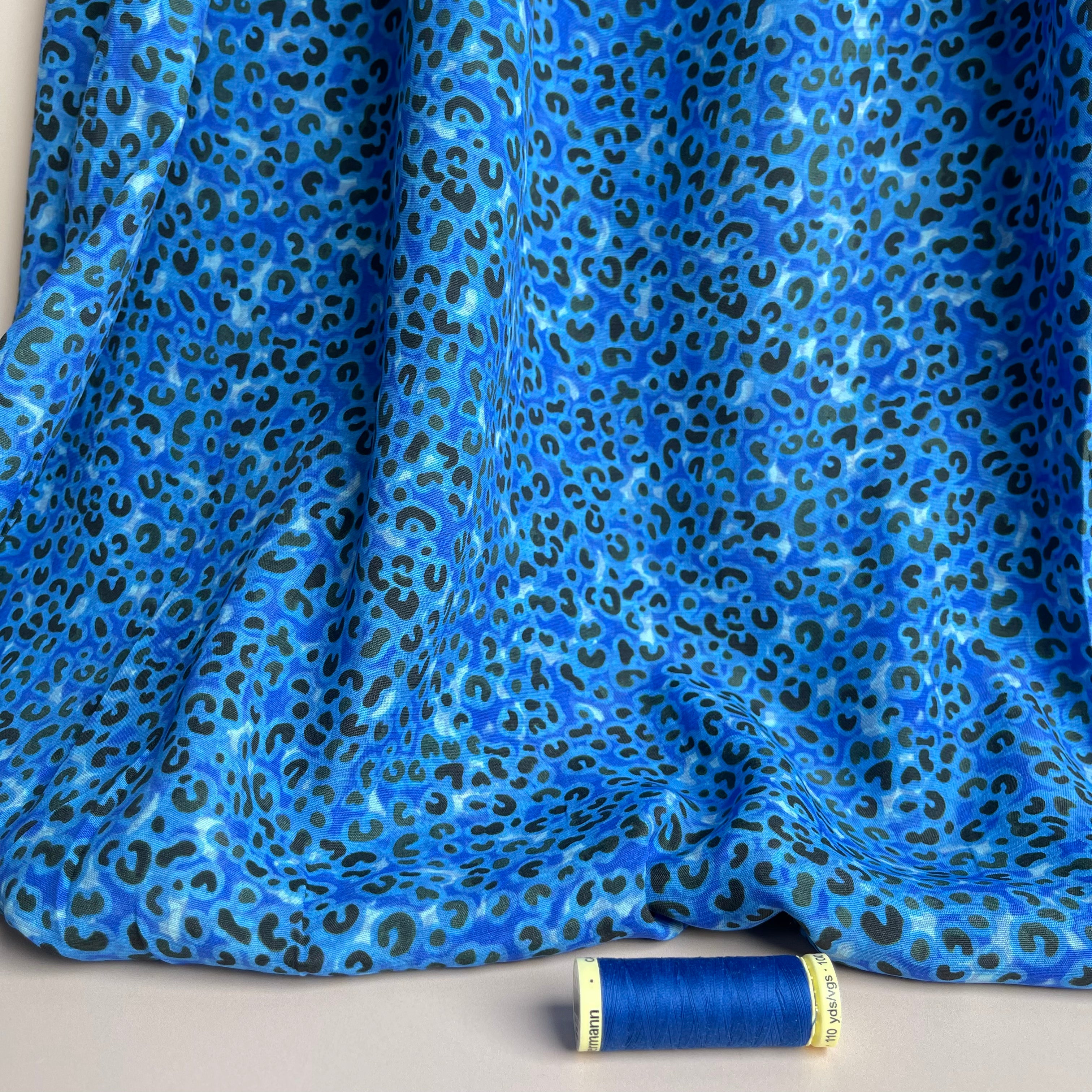 Leopard Print in Cobalt Viscose Crepe with LENZING™ ECOVERO™ fibres.