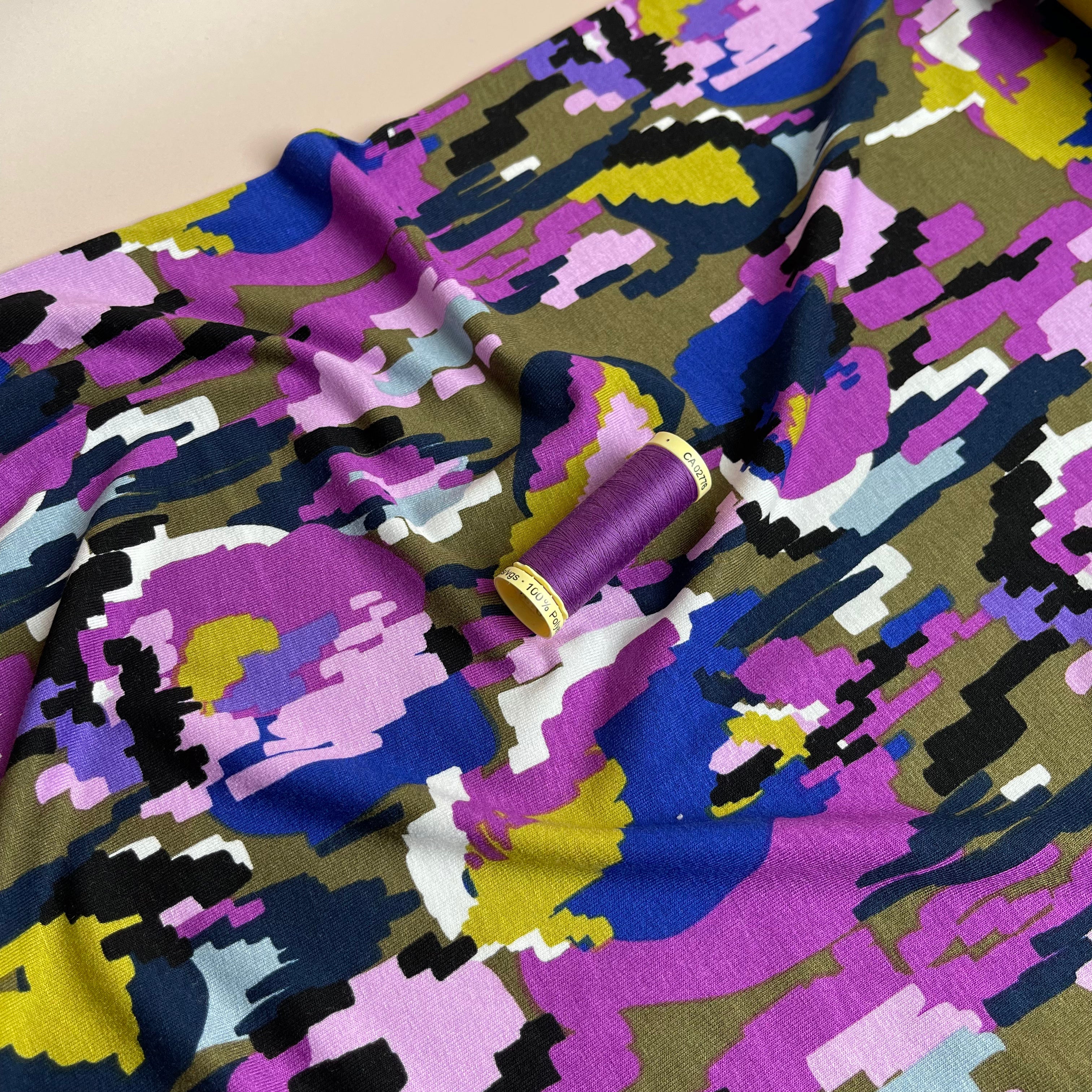 REMNANT 0.68 Metres (plus free section with faults) - Pixel Flowers in Purple Viscose Jersey Fabric