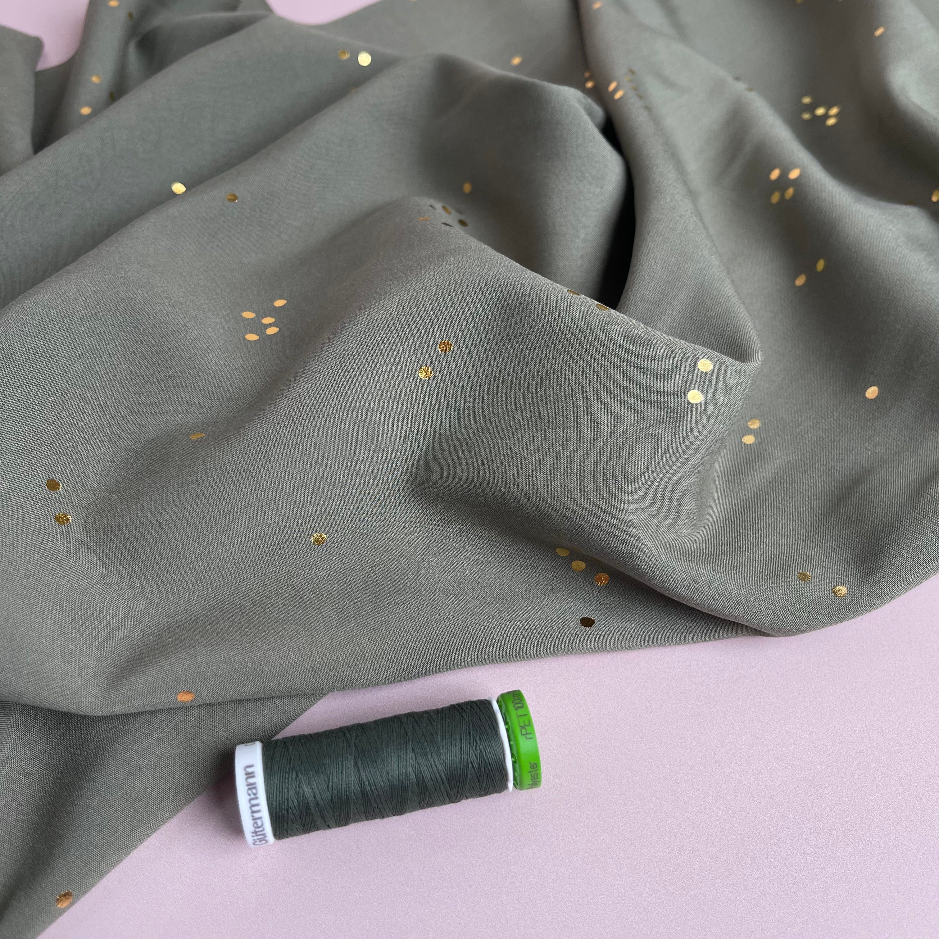 Sparkles in Olive Green Viscose Fabric