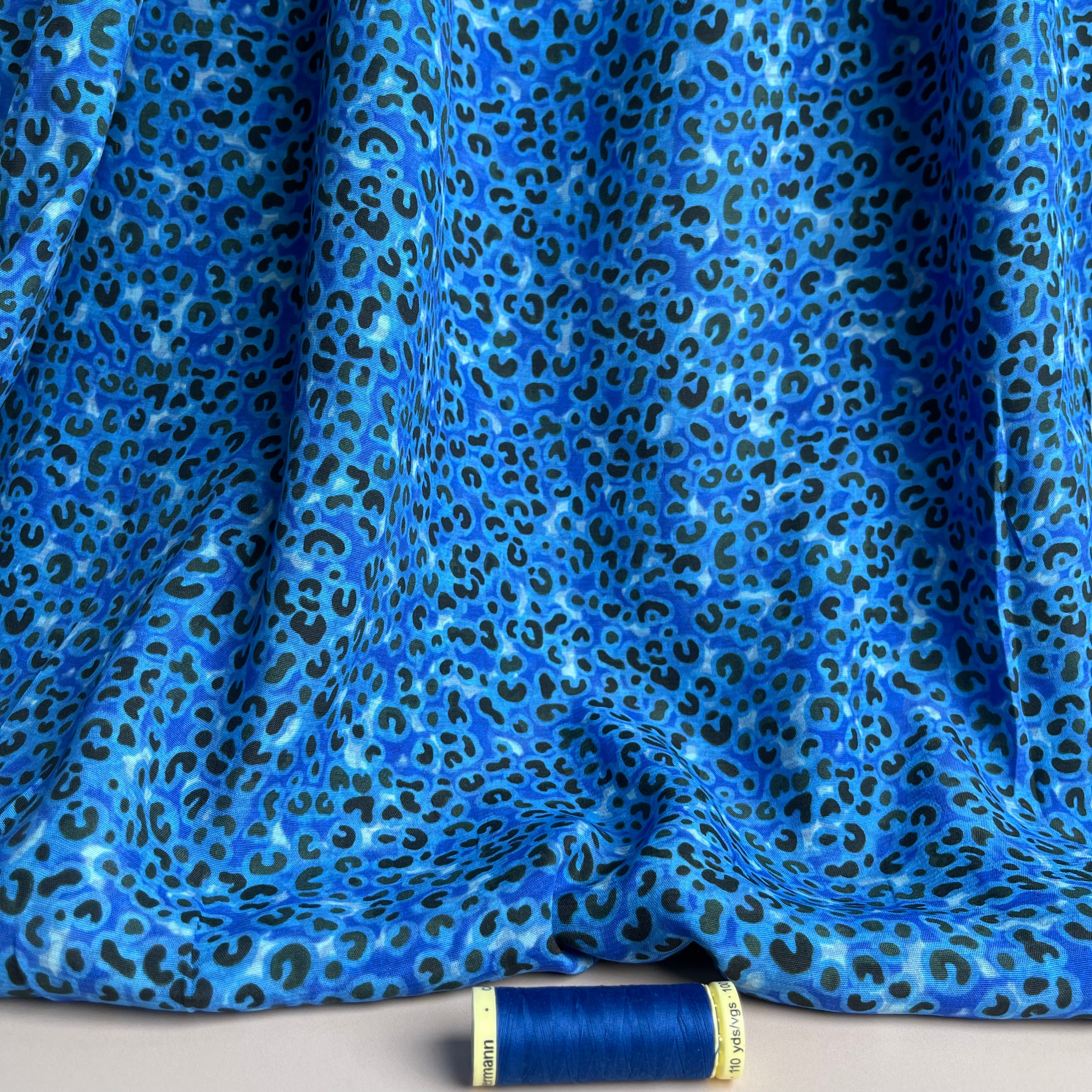Leopard Print in Cobalt Viscose Crepe with LENZING™ ECOVERO™ fibres.