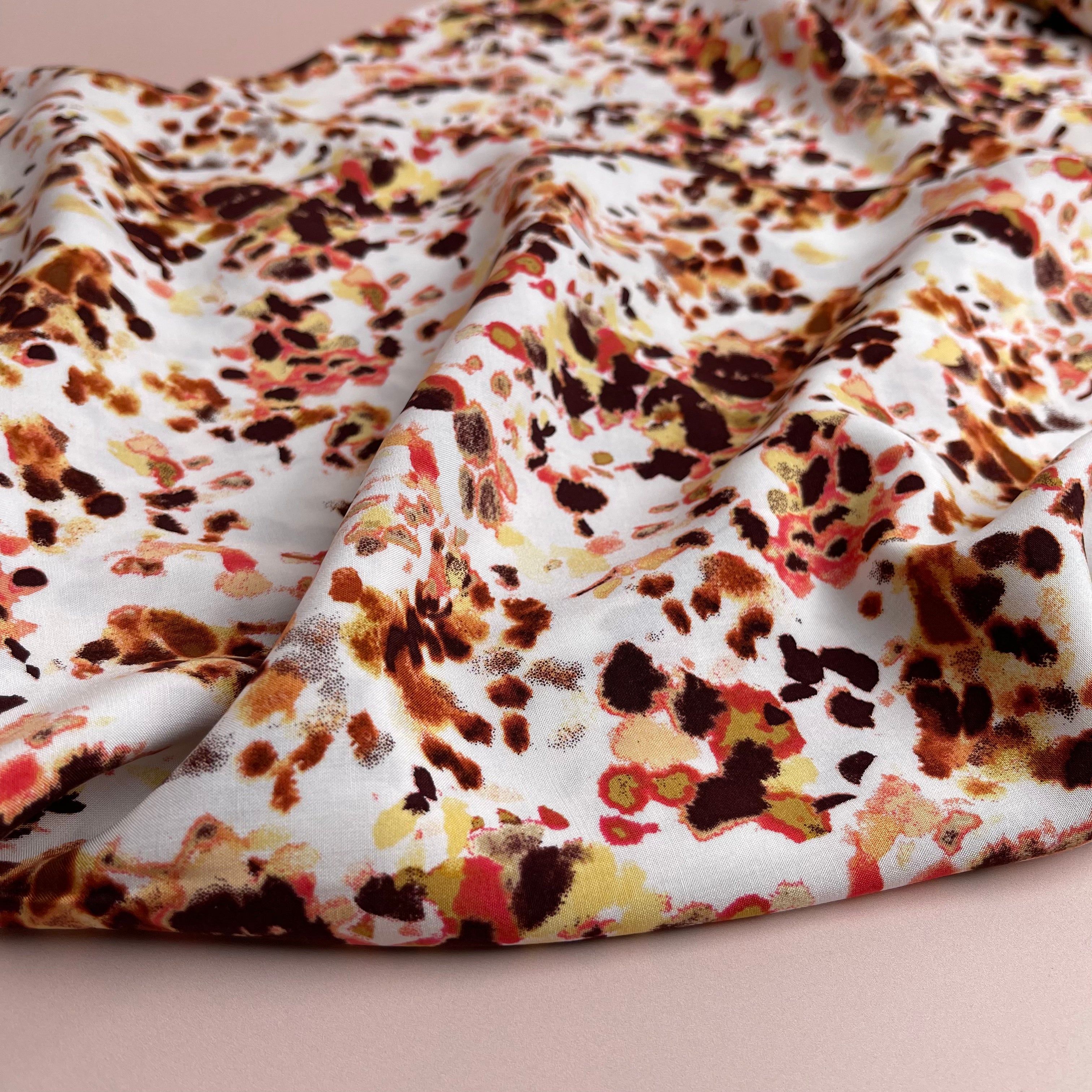 Watercolour Splash in Rust Viscose Poplin Fabric