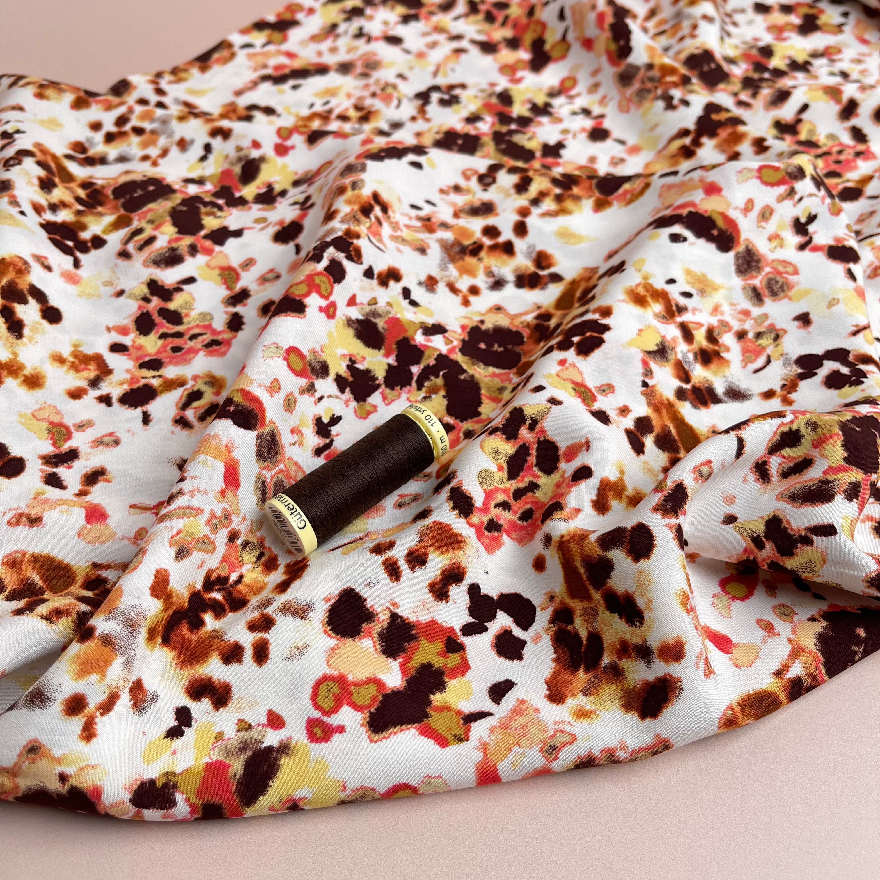 Watercolour Splash in Rust Viscose Poplin Fabric