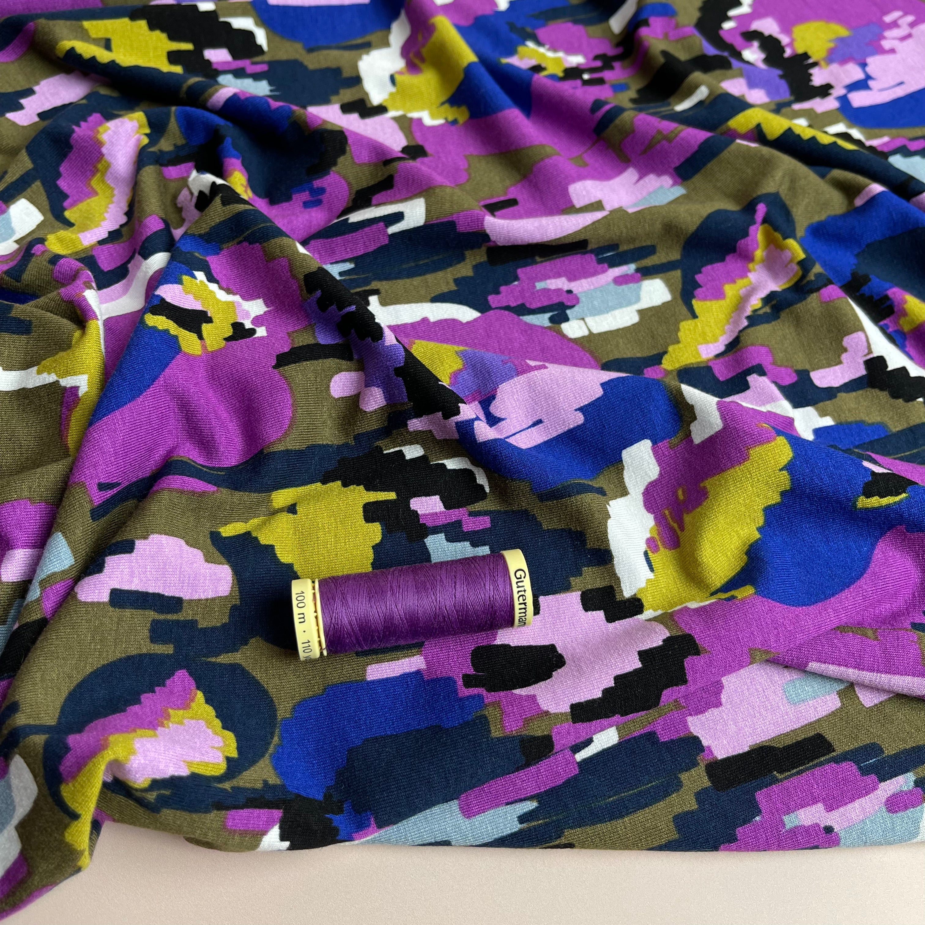 REMNANT 0.68 Metres (plus free section with faults) - Pixel Flowers in Purple Viscose Jersey Fabric