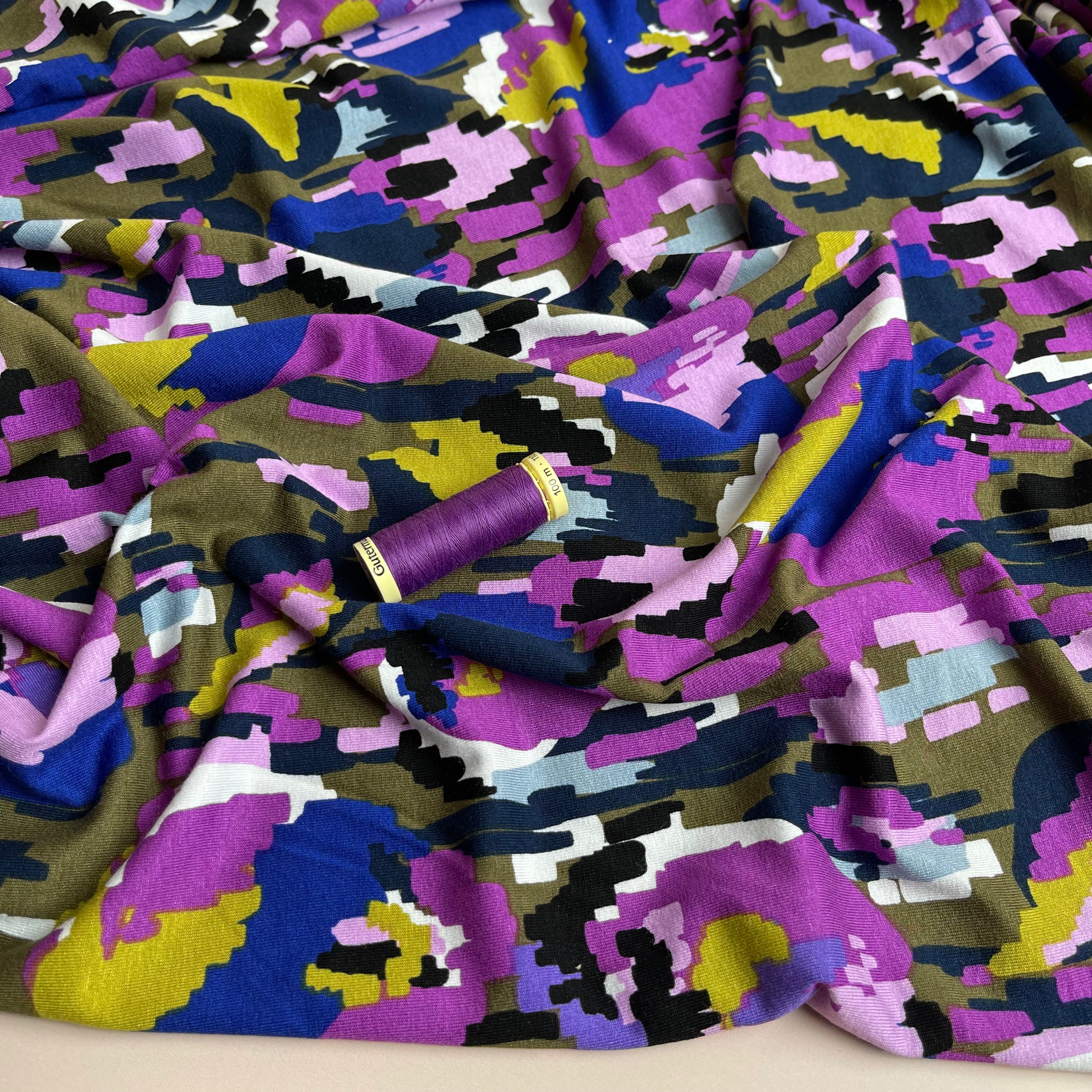 REMNANT 0.68 Metres (plus free section with faults) - Pixel Flowers in Purple Viscose Jersey Fabric