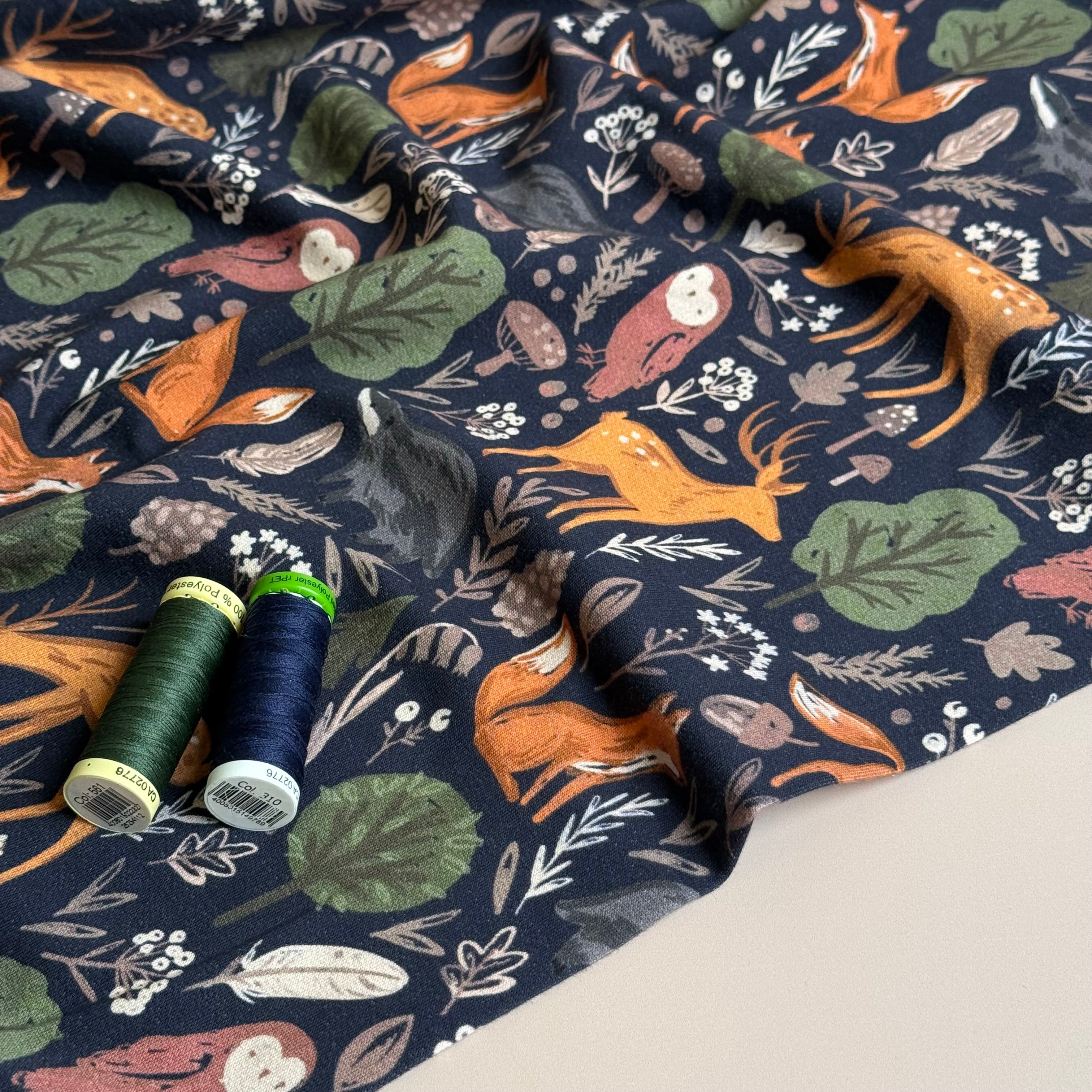 Woodland Anmals on Dark Navy Cotton Sweat Shirting Fabric