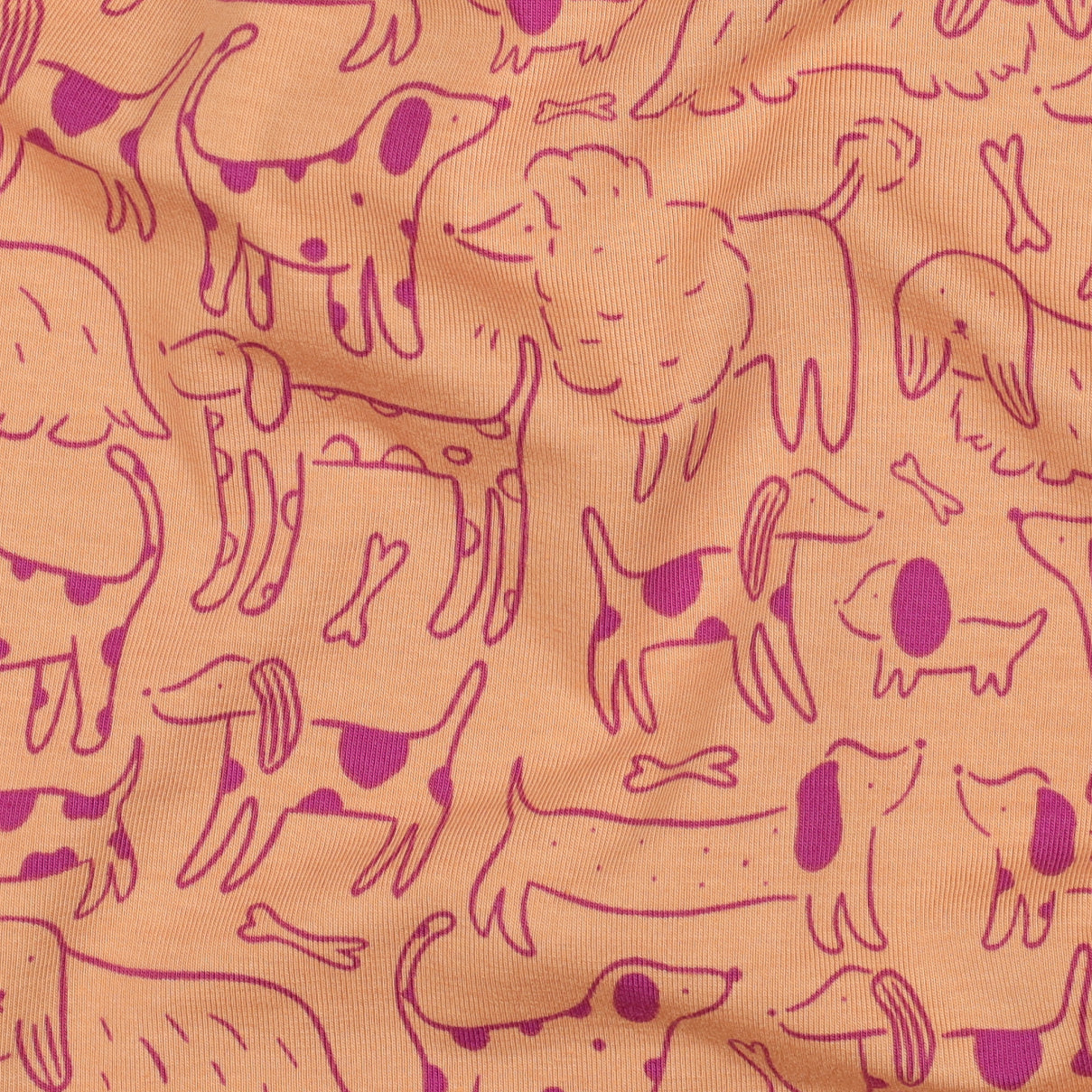 Dog Park on Peach Cotton Jersey Fabric