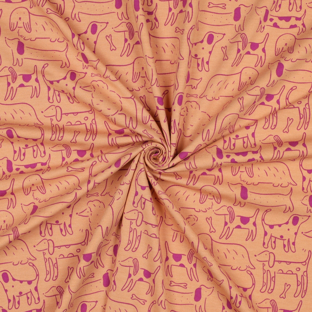 Dog Park on Peach Cotton Jersey Fabric