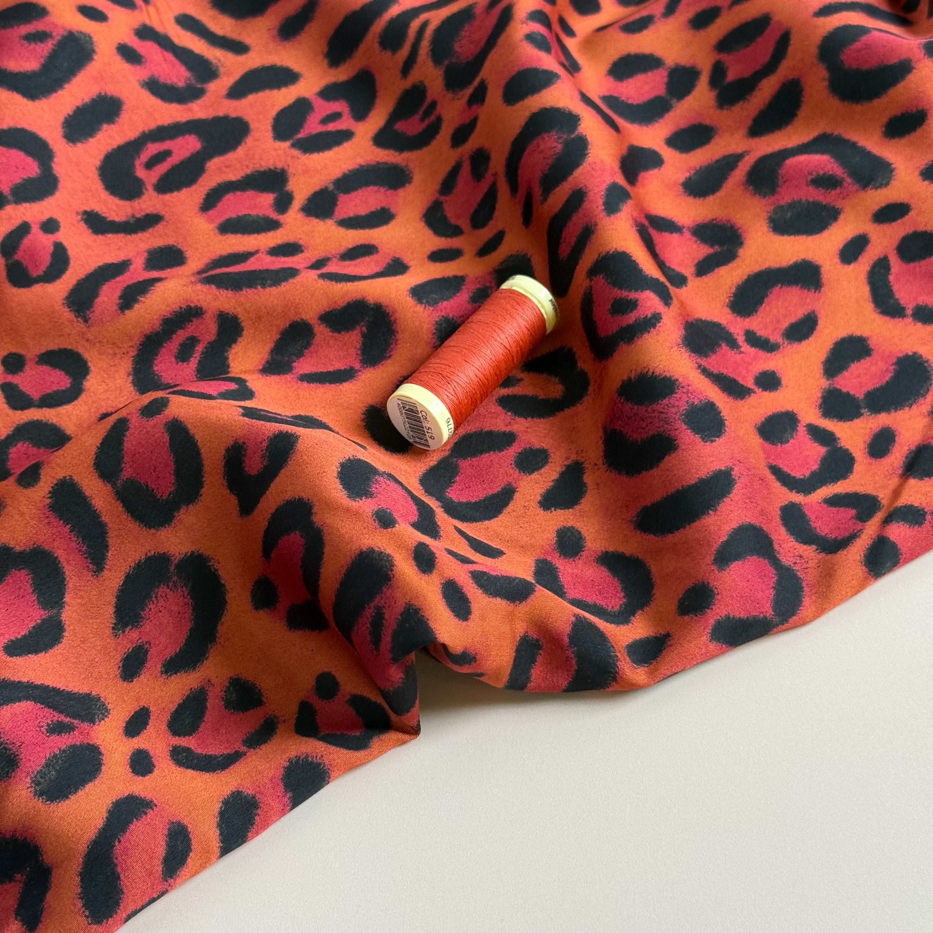 Animal Print Orange Viscose Sateen Fabric