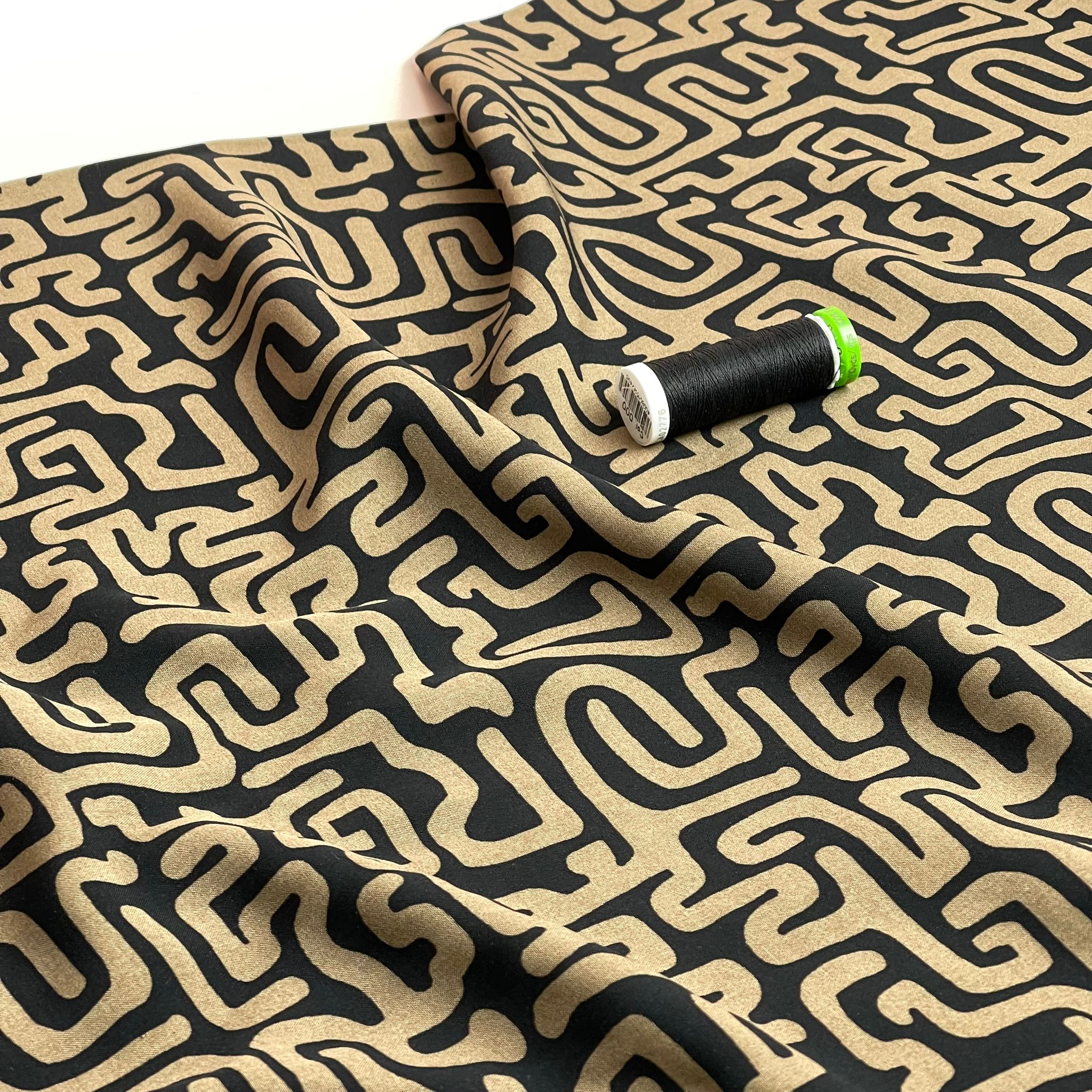 Maze on Black Viscose Poplin Fabric