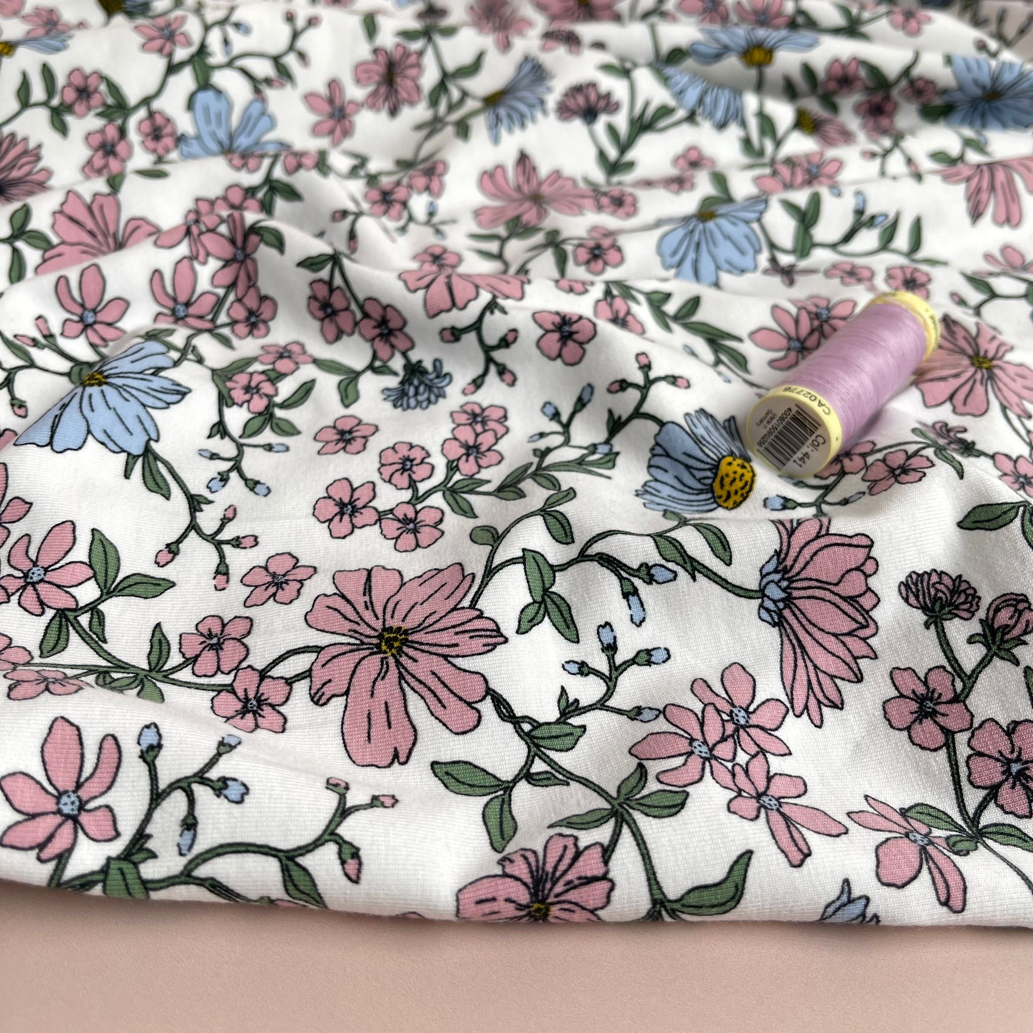 Pink Flowers on White Cotton Jersey Fabric