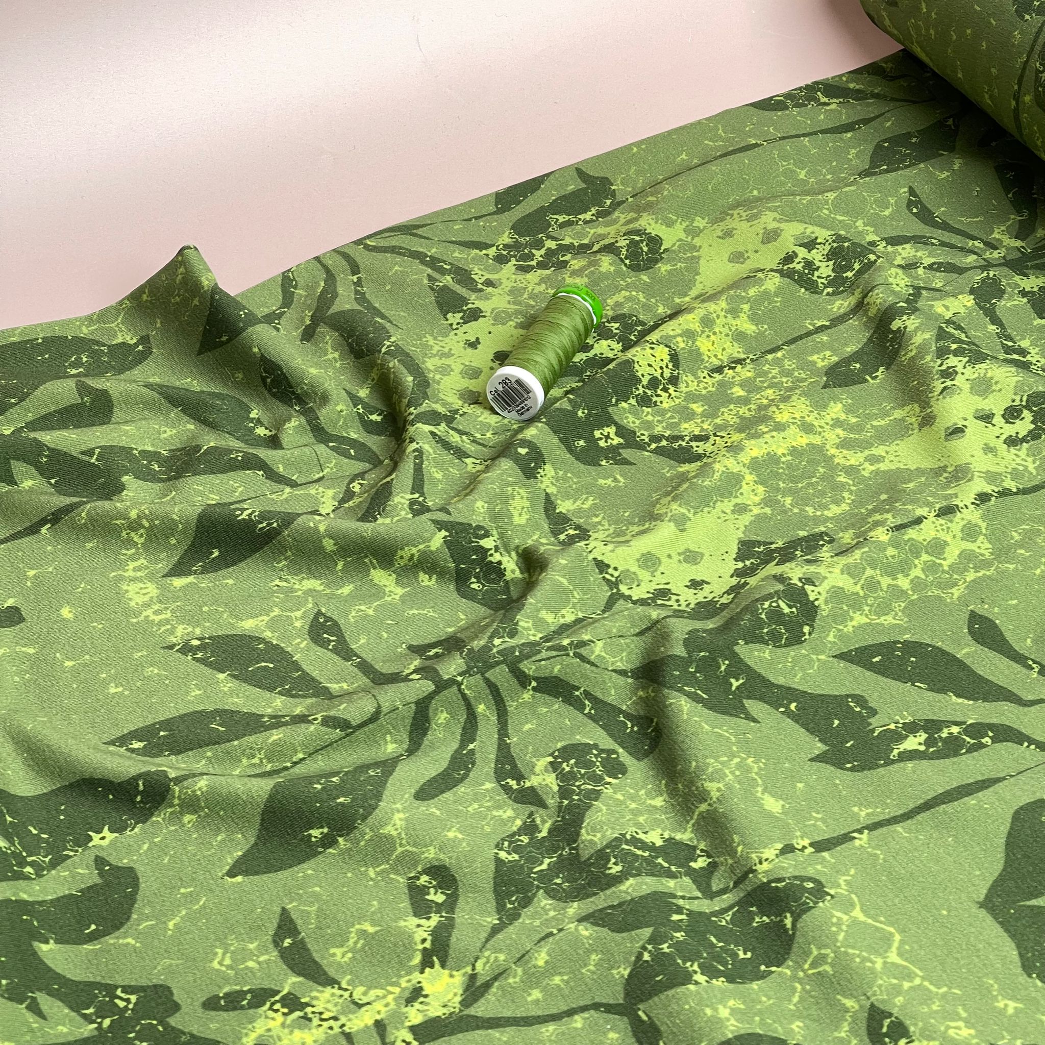 Danish Design - Foliage Shadows on Green Cotton Jersey Fabric