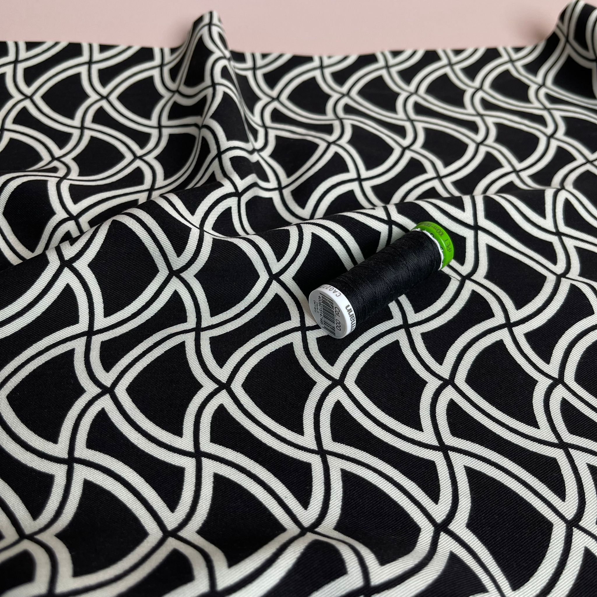 Abstract Waves on Black Viscose Twill Fabric