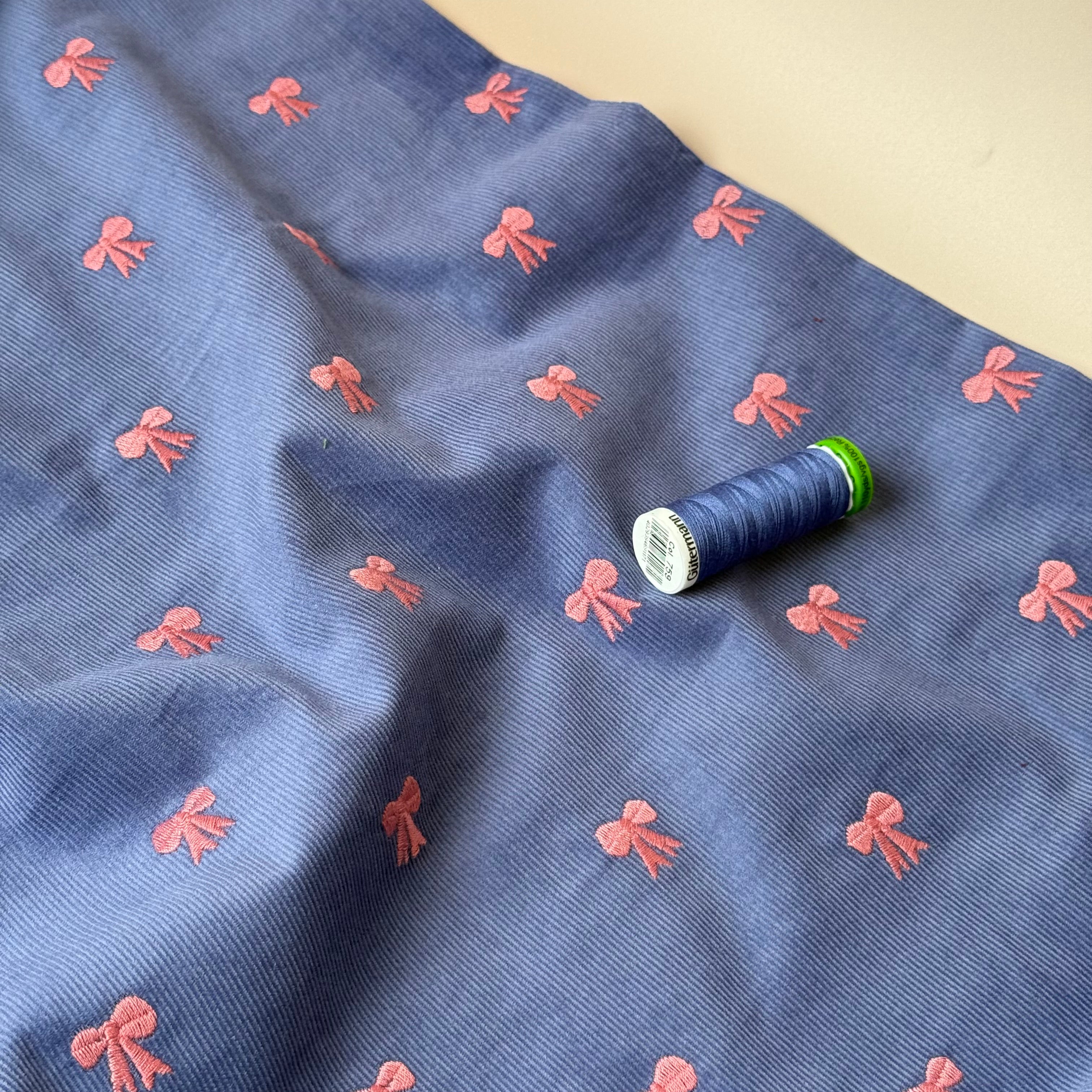 Embroidered Bows on Cornflower Blue Cotton Needlecord