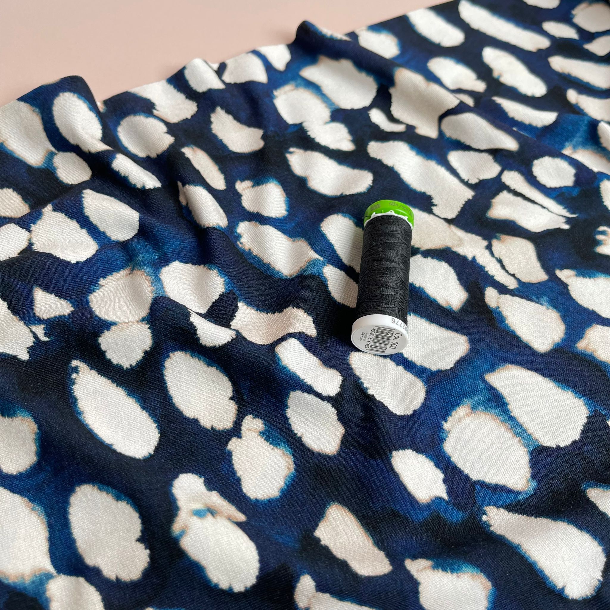 Ex-Designer Deadstock Fuzzy Raindrops on Navy Blue Viscose Jersey Fabric