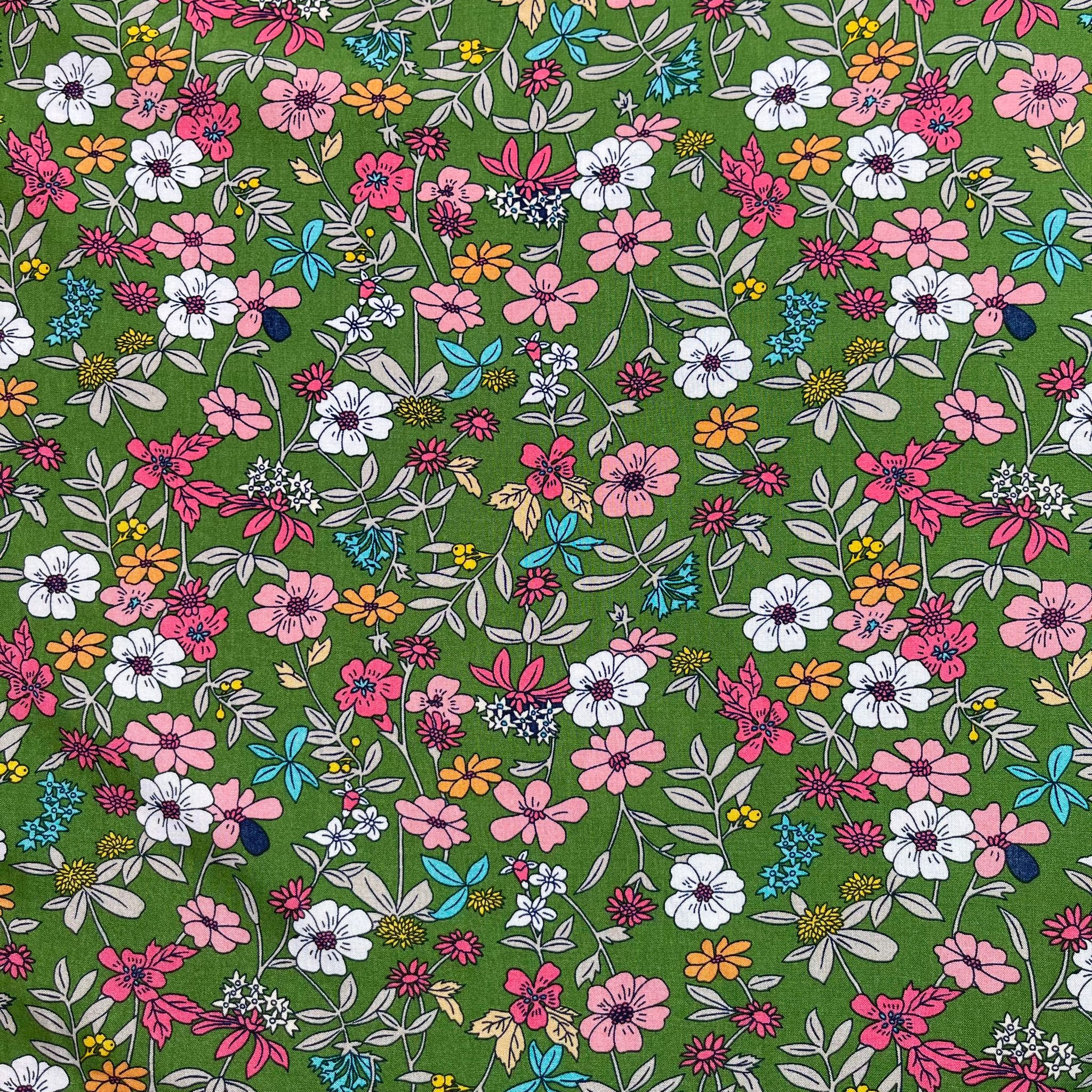 Spring Blossoms on Green Viscose Fabric