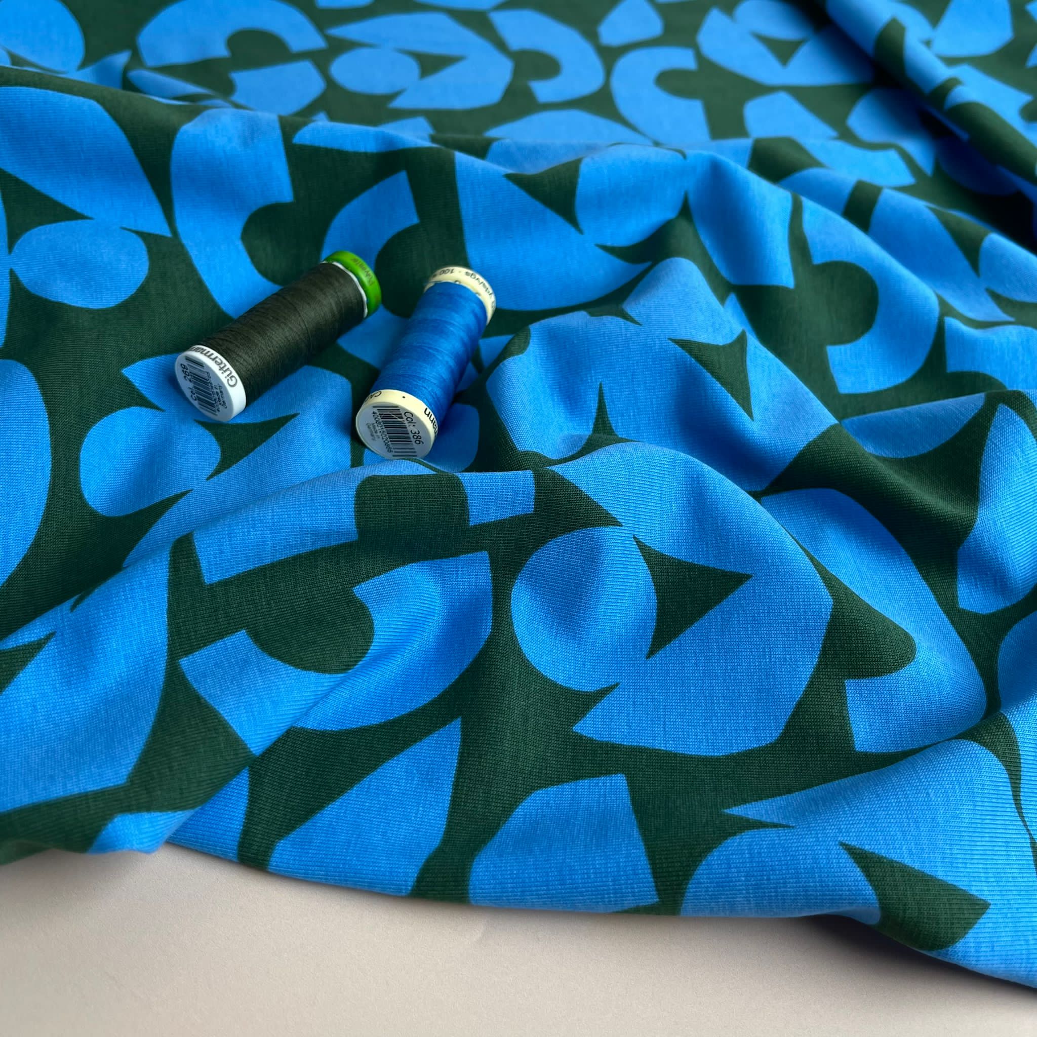 Blue Shapes on Khaki Combed Cotton Jersey Fabric