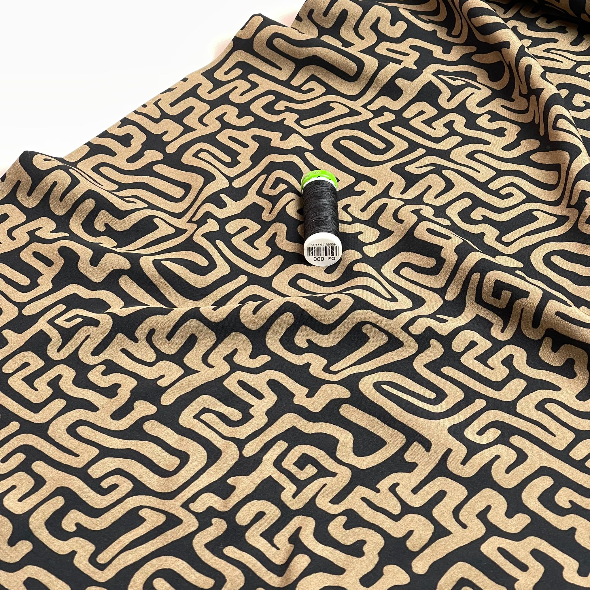 Maze on Black Viscose Poplin Fabric