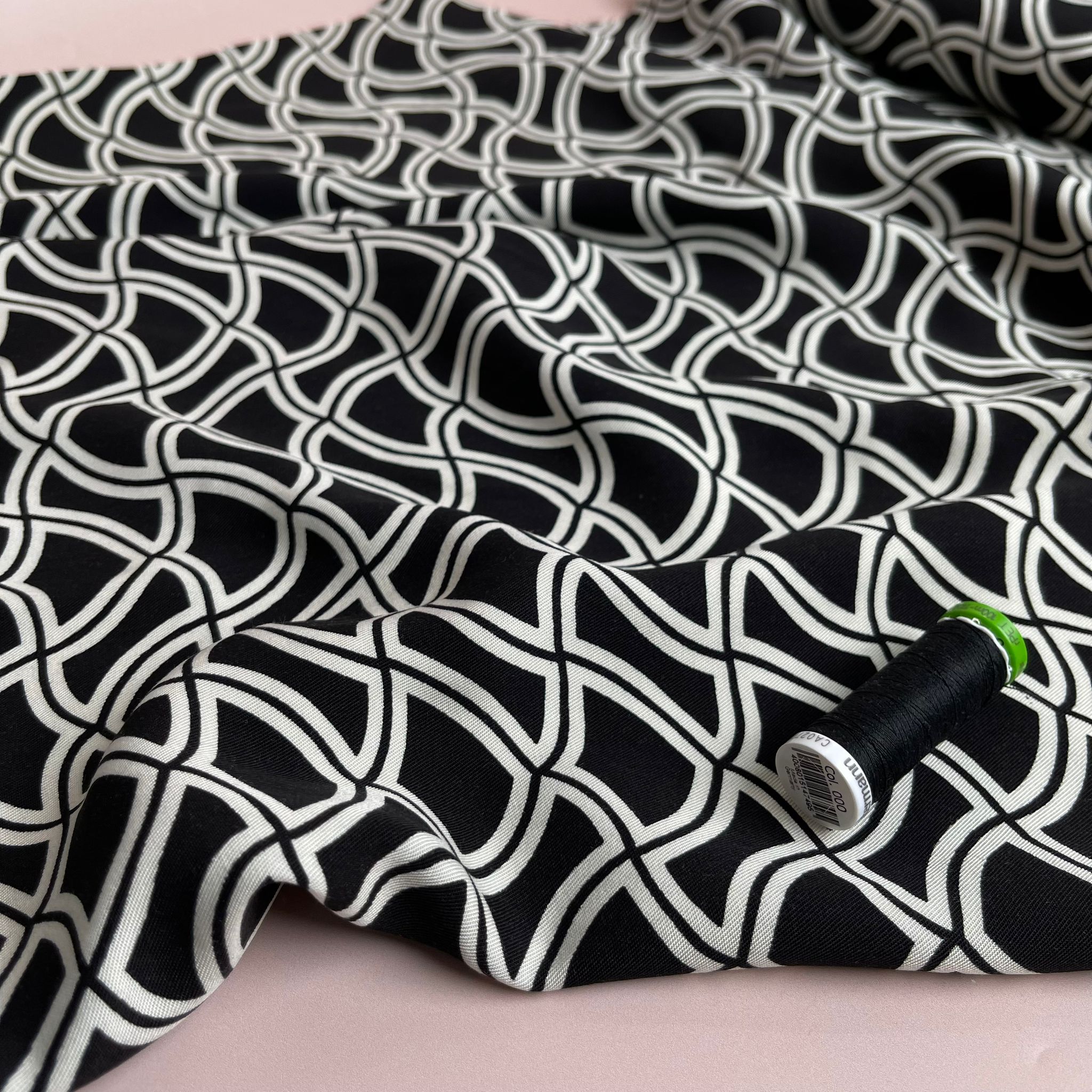 Abstract Waves on Black Viscose Twill Fabric