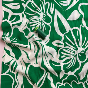 White Blooms on Emerald Green Viscose Fabric