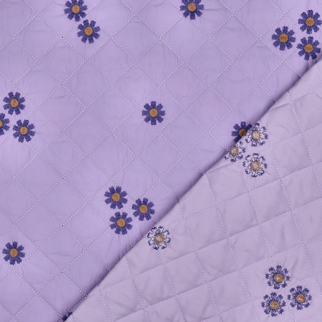 Embroidered Flowers on Lilac Quilted Fabric