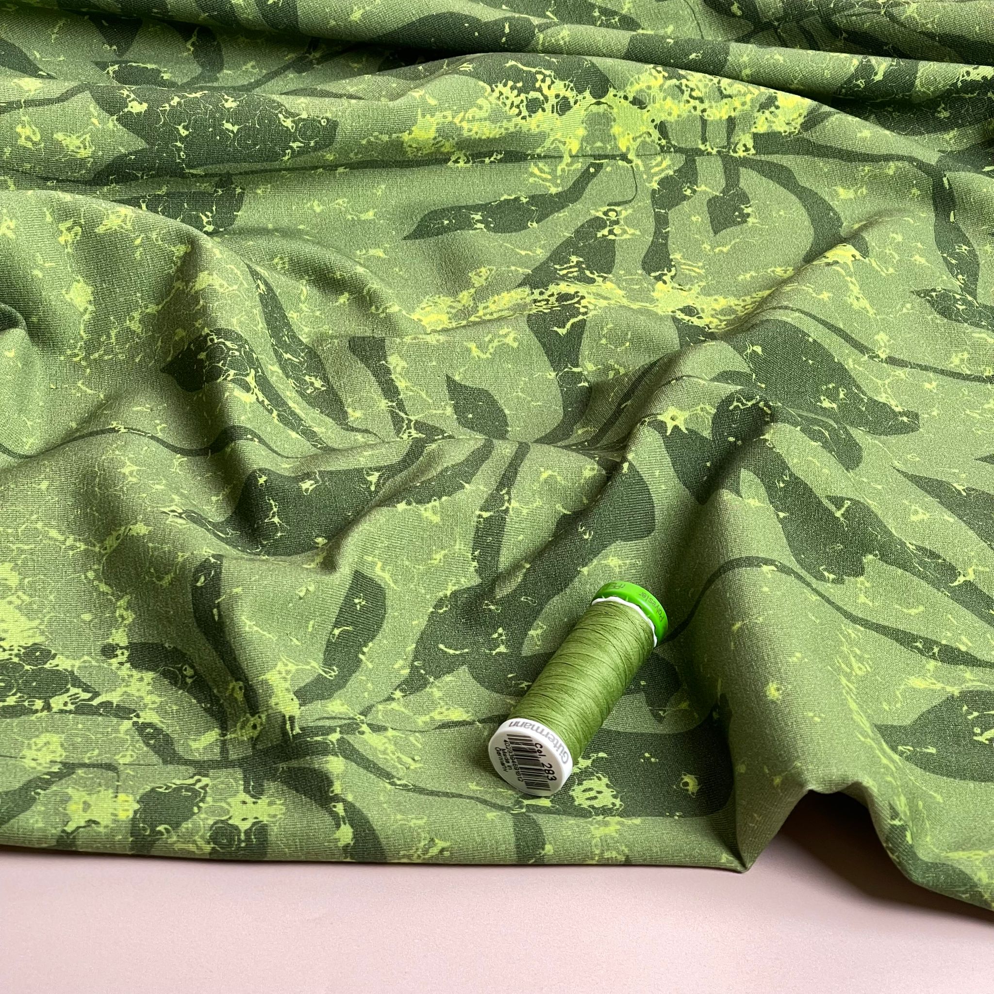 Danish Design - Foliage Shadows on Green Cotton Jersey Fabric