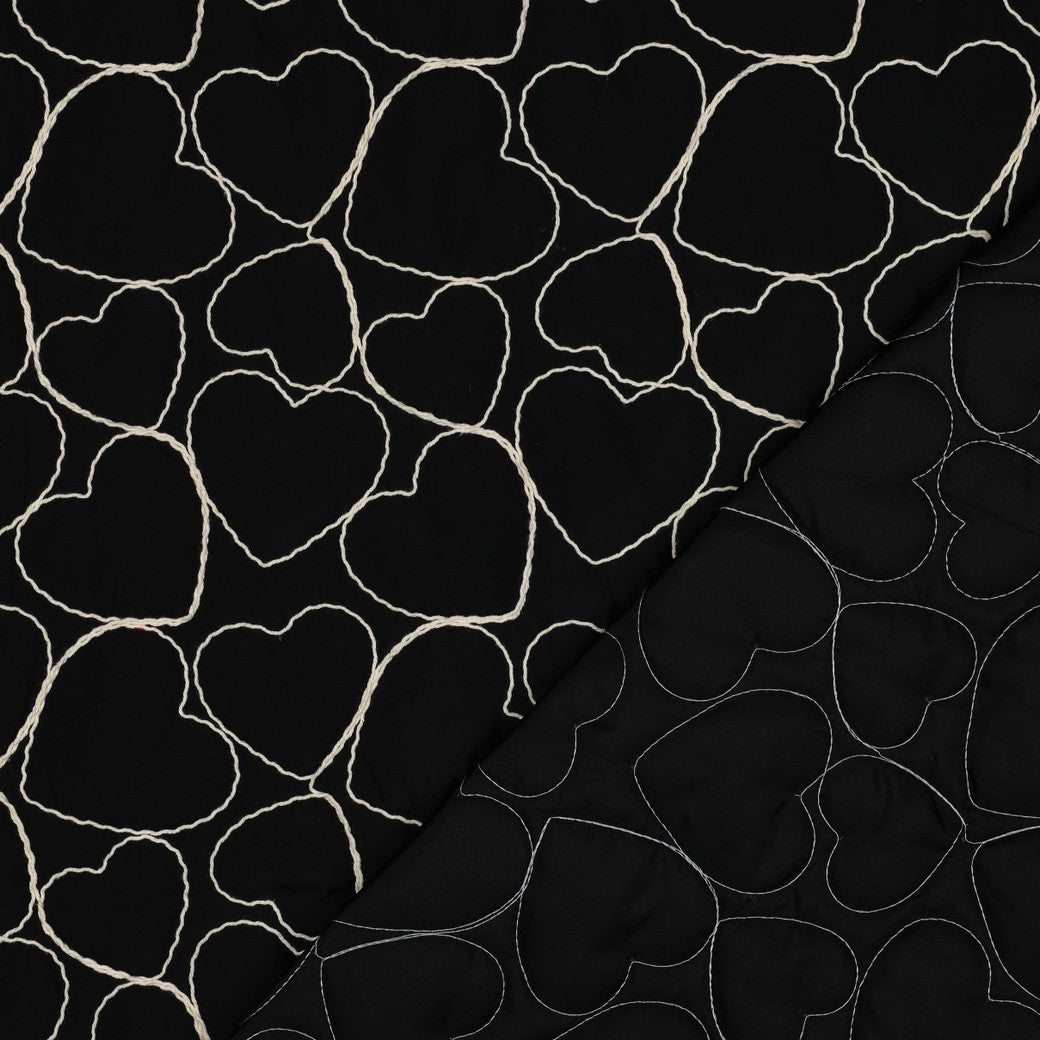 Embroidered Hearts on Black Quilted Fabric
