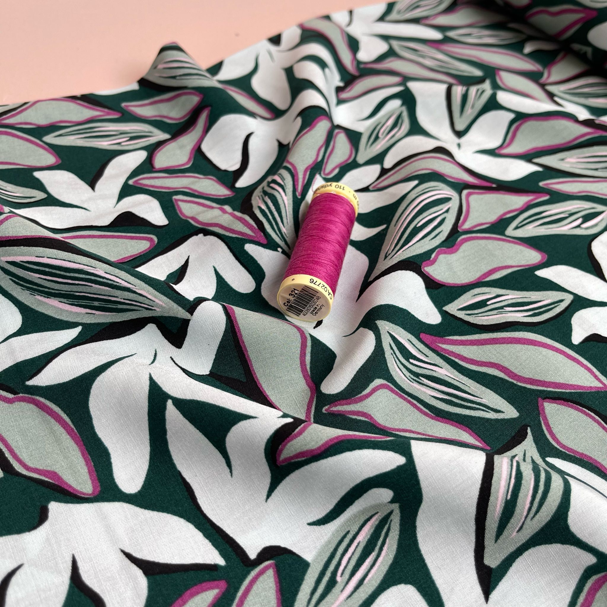 Abstract Leaves on Bottle Green Viscose Fabric