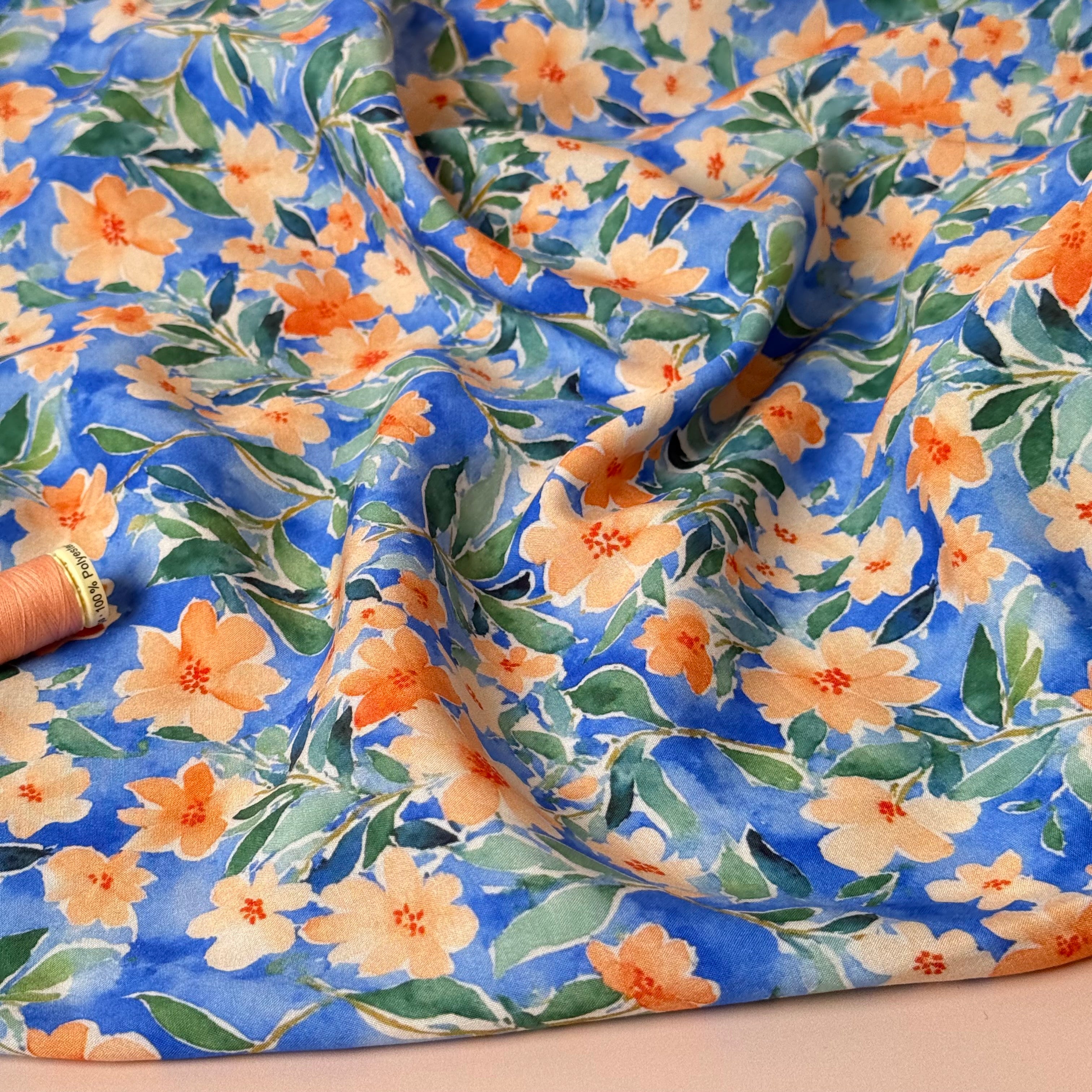 Peach Watercolour Flowers on Blue Viscose Fabric