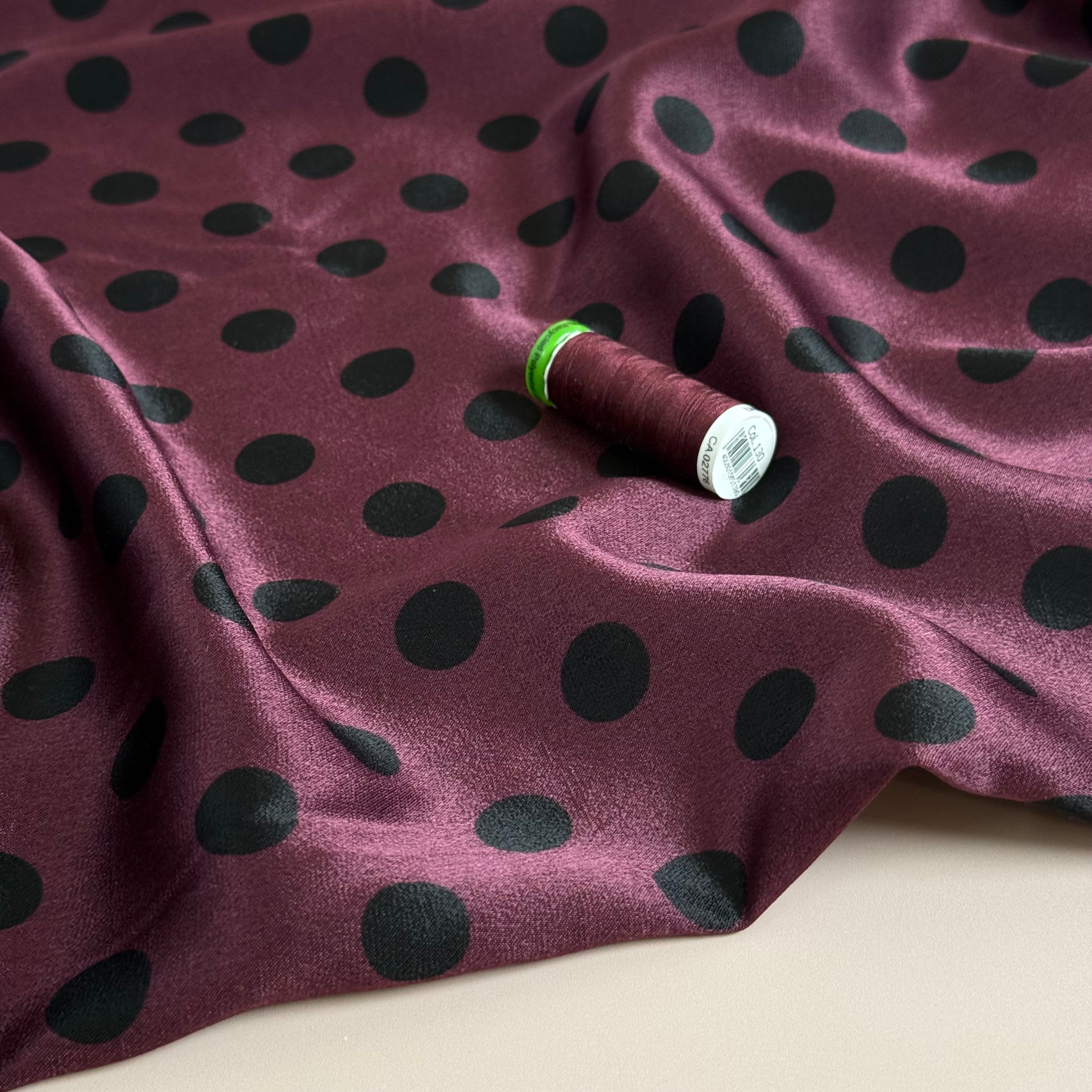 Polka Black on Wine Spun Viscose Sateen Fabric