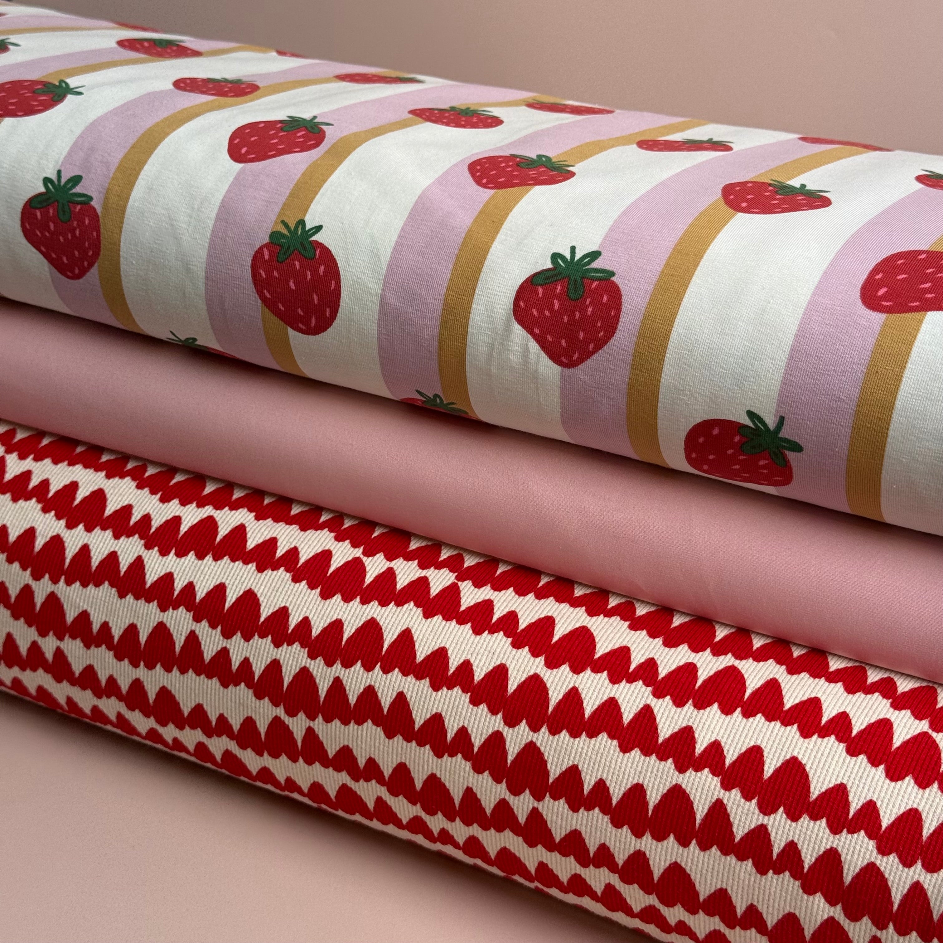 Strawberries in Lanes Pink Cotton Jersey Fabric