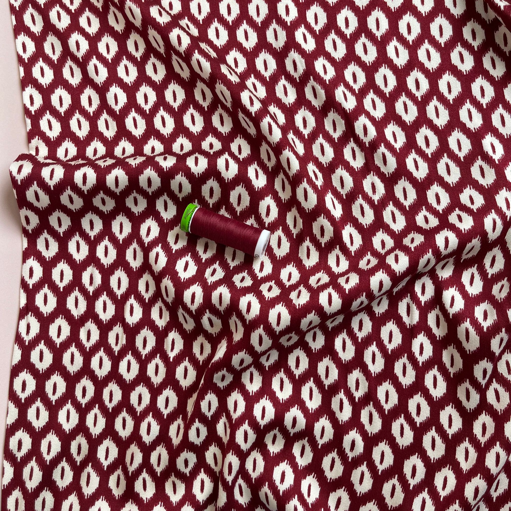 REMNANT 1.79 Metres (plus extra section with slight fading)  - Abstract Rhombus on Burgundy Viscose Twill Sateen Fabric