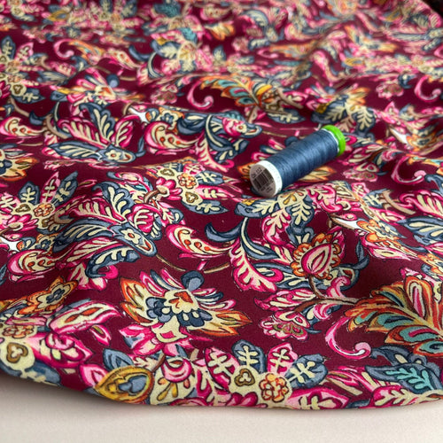 Rainbow Paisley on Burgundy Viscose Fabric