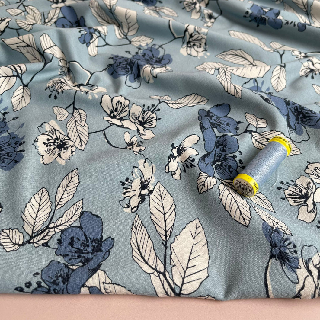 Danish Design - Elegant Florals on Pale Blue Cotton Jersey Fabric