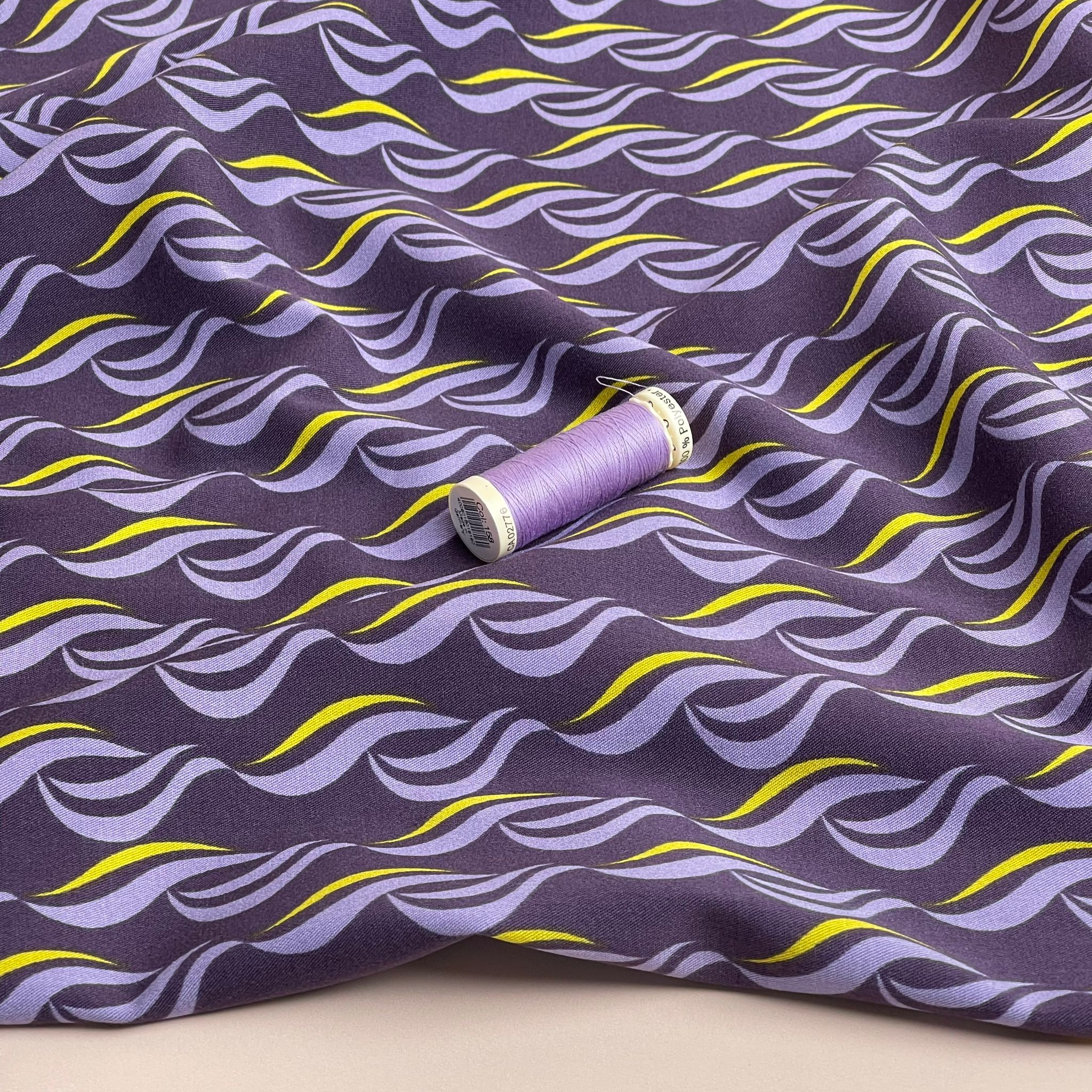 Rosella Waves on Purple Viscose Twill with Stretch