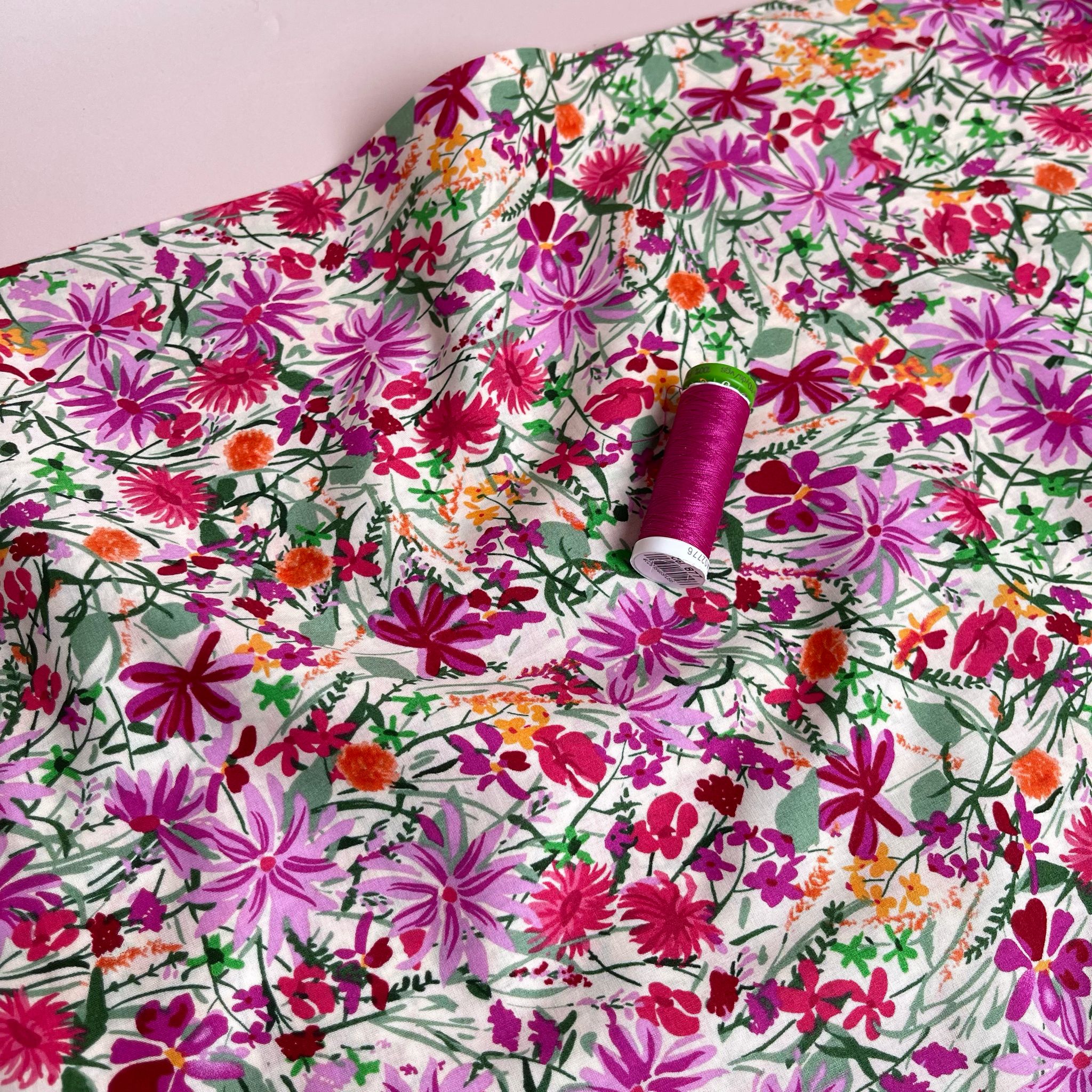 Magenta Meadow on White Cotton Lawn Fabric