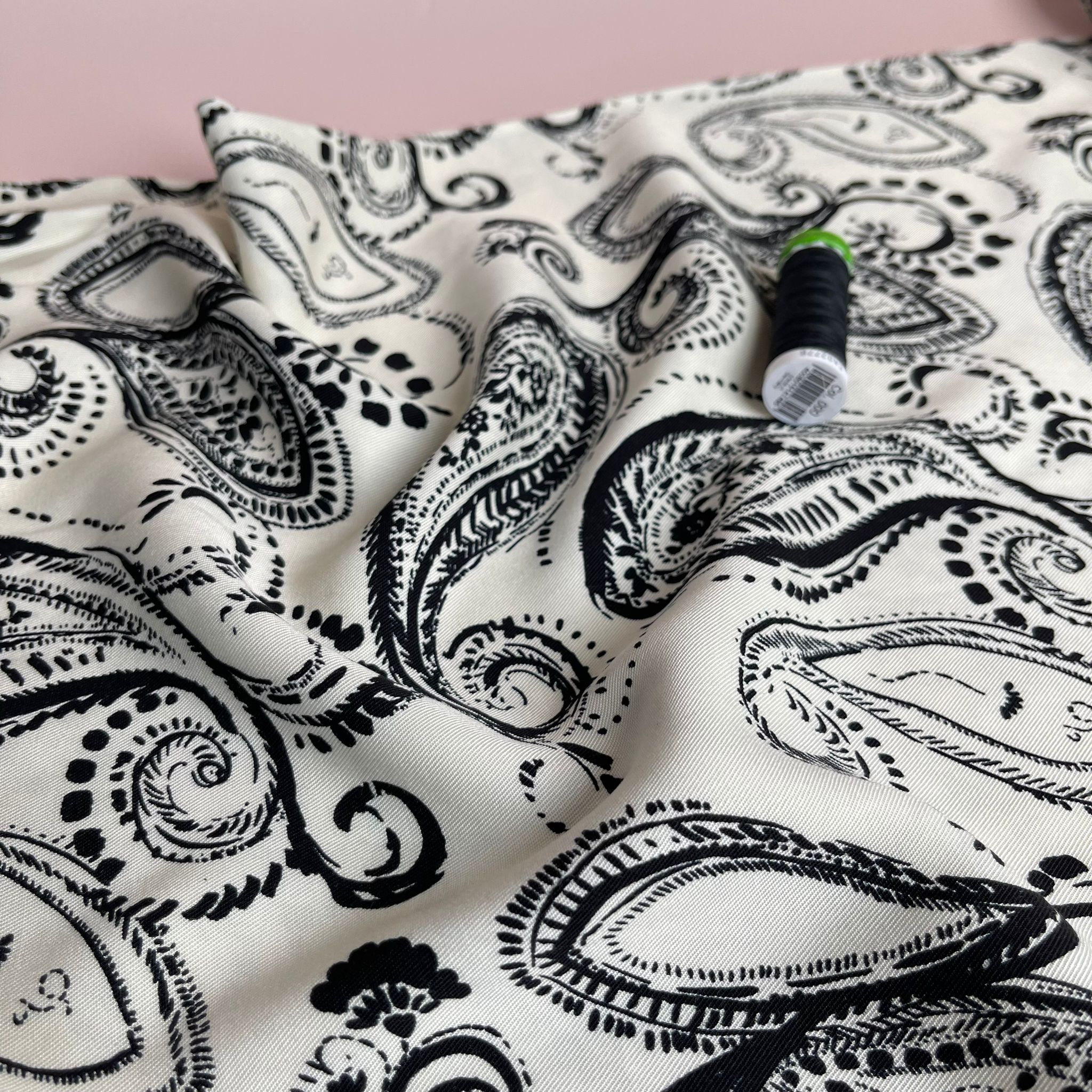 Black Paisley on Off-White Viscose Twill Fabric