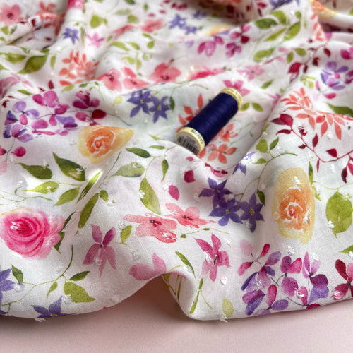 Watercolour Spring Blooms on Whtie Dobby Viscose Fabric