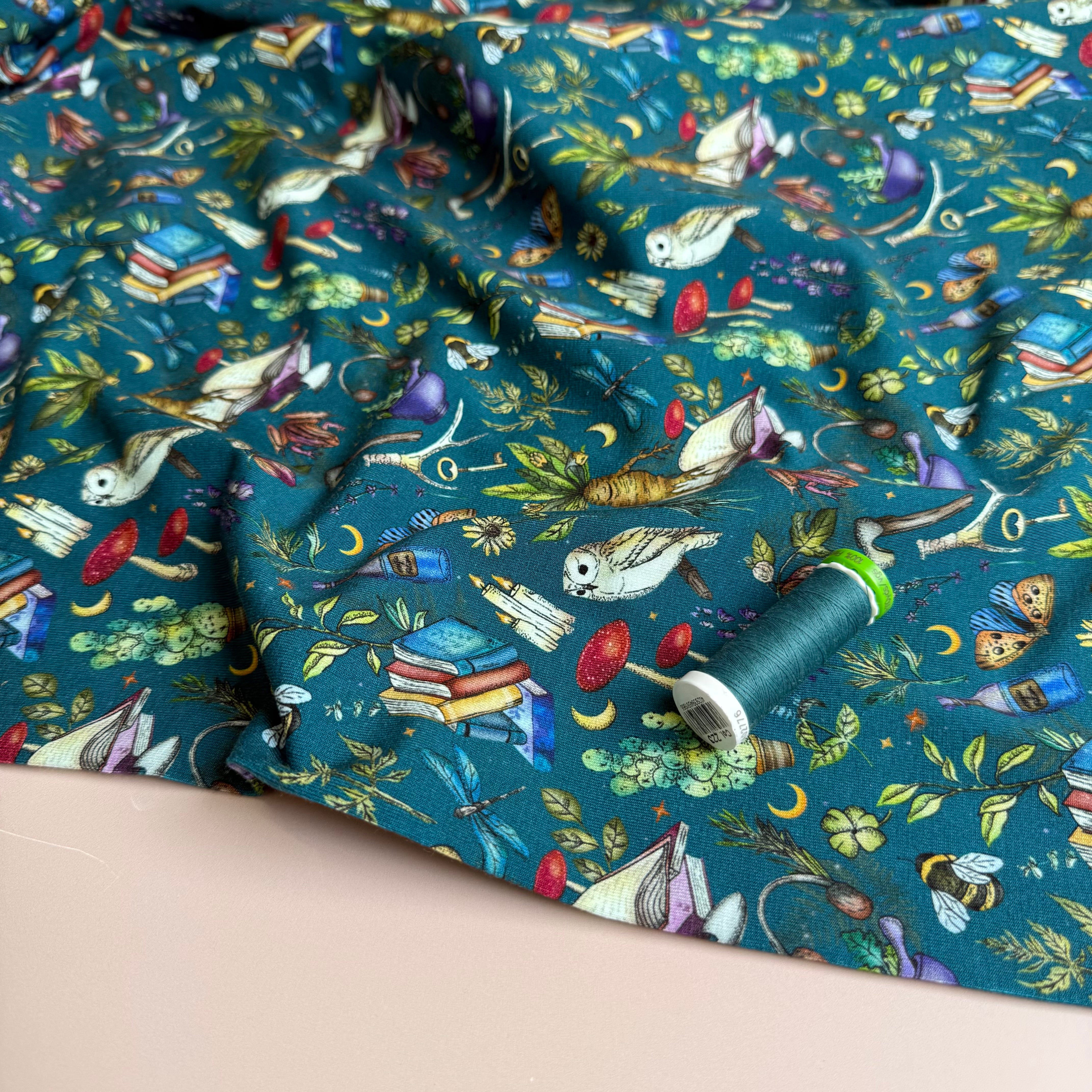 Magical Symbols Teal Cotton Jersey Fabric