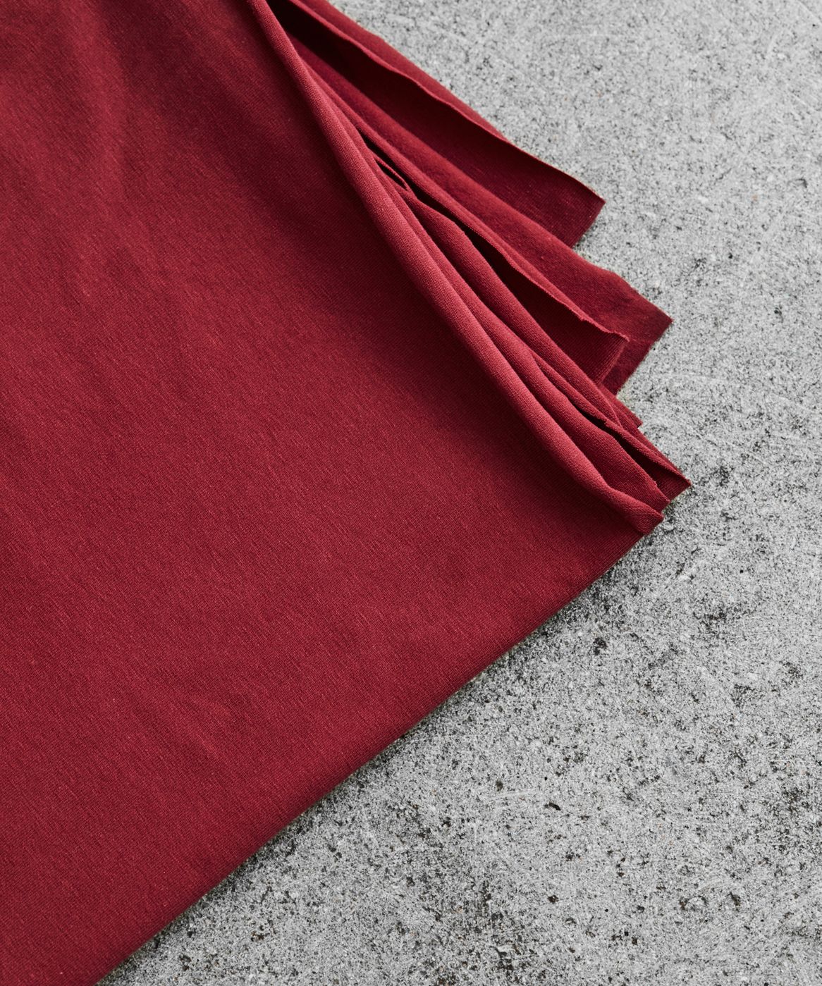 REMNANT 1.64 metres with dirt marks near selvedge - Red Organic Single Stretch Jersey