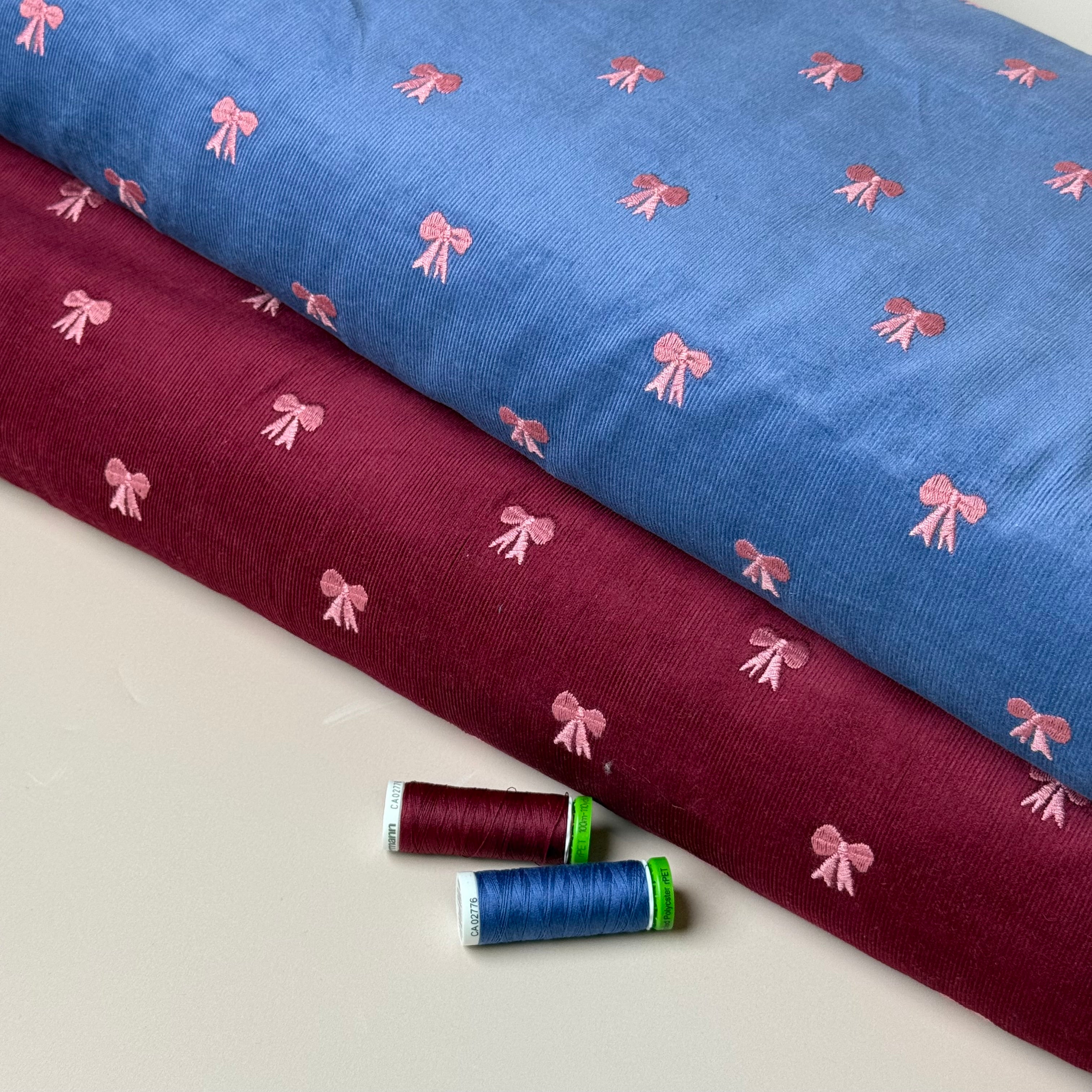 Embroidered Bows on Cornflower Blue Cotton Needlecord