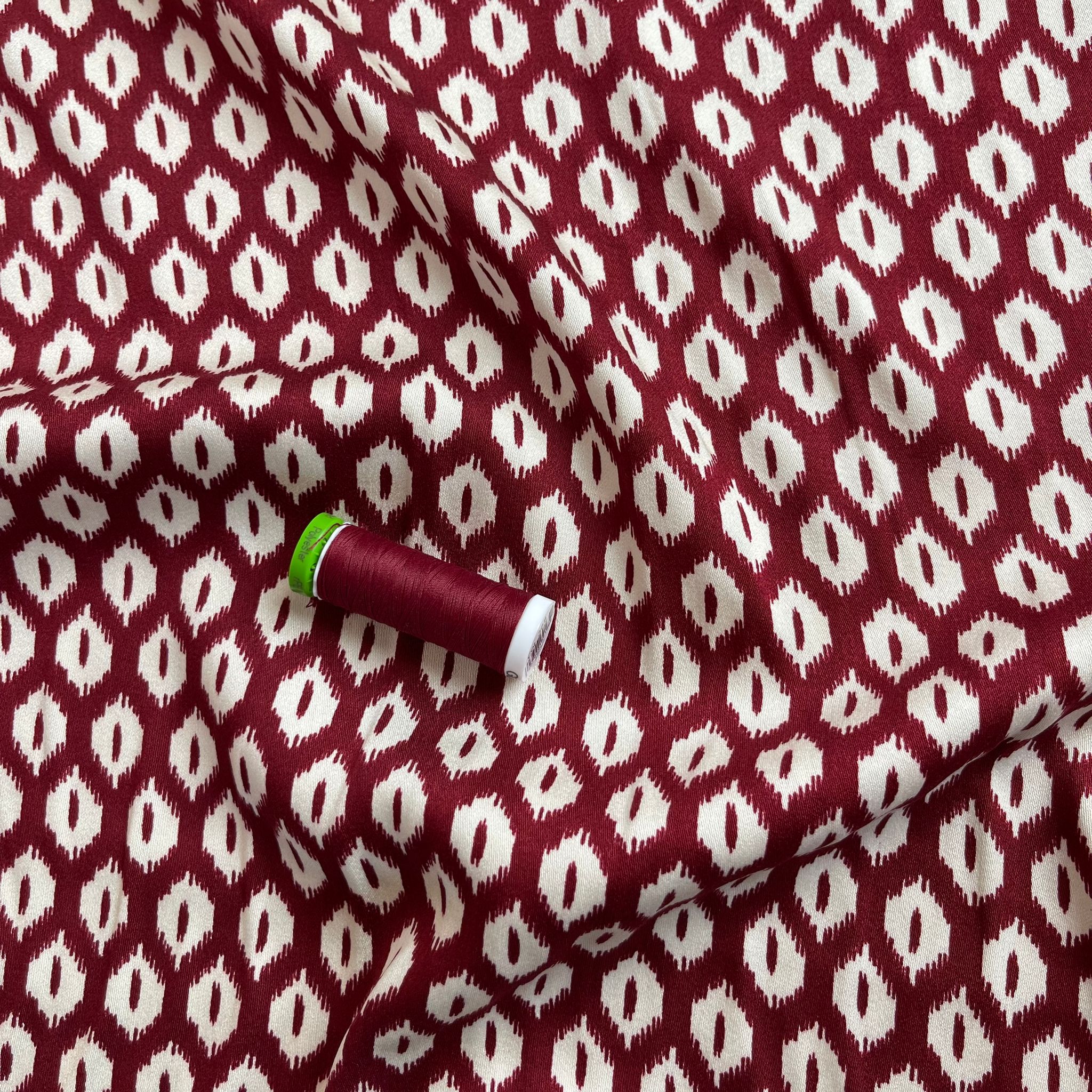 REMNANT 1.79 Metres (plus extra section with slight fading)  - Abstract Rhombus on Burgundy Viscose Twill Sateen Fabric