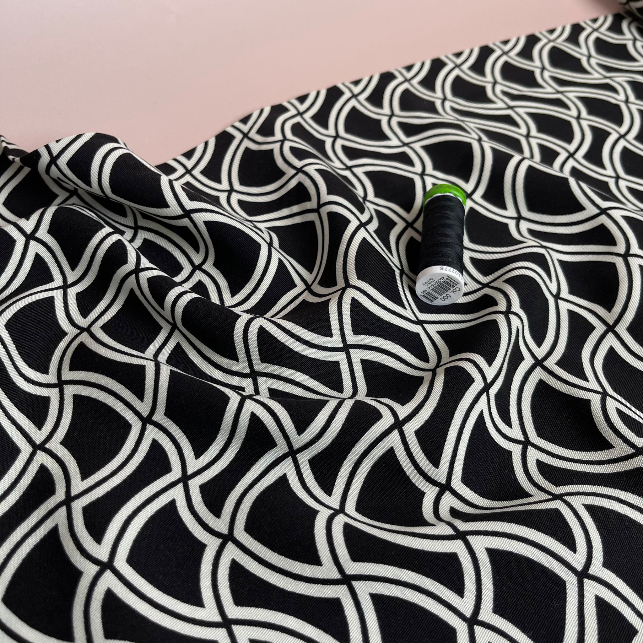 Abstract Waves on Black Viscose Twill Fabric